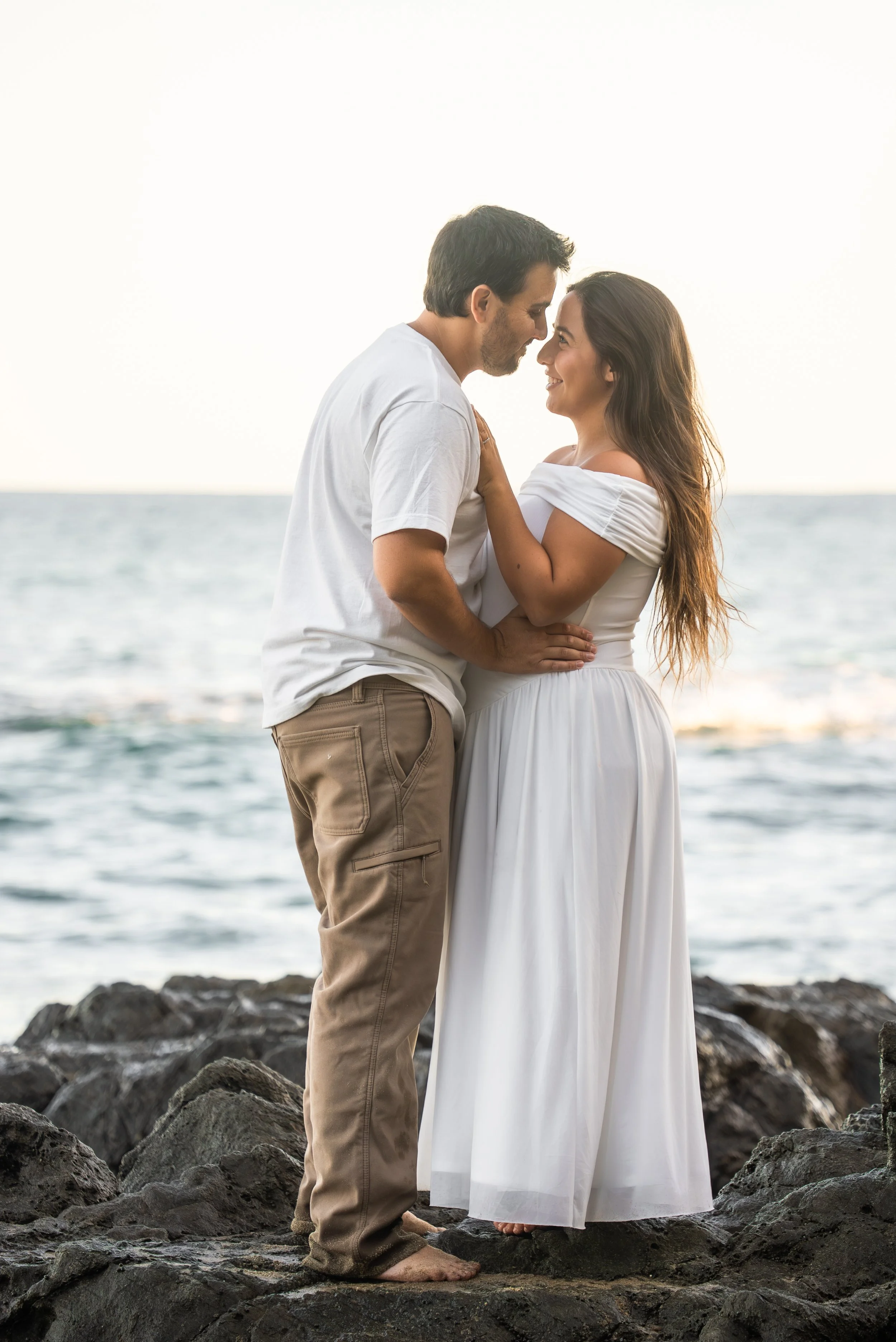 crescent-bay-beach-laguna-beach-ca-maternity-session-rocks-embrace.jpg