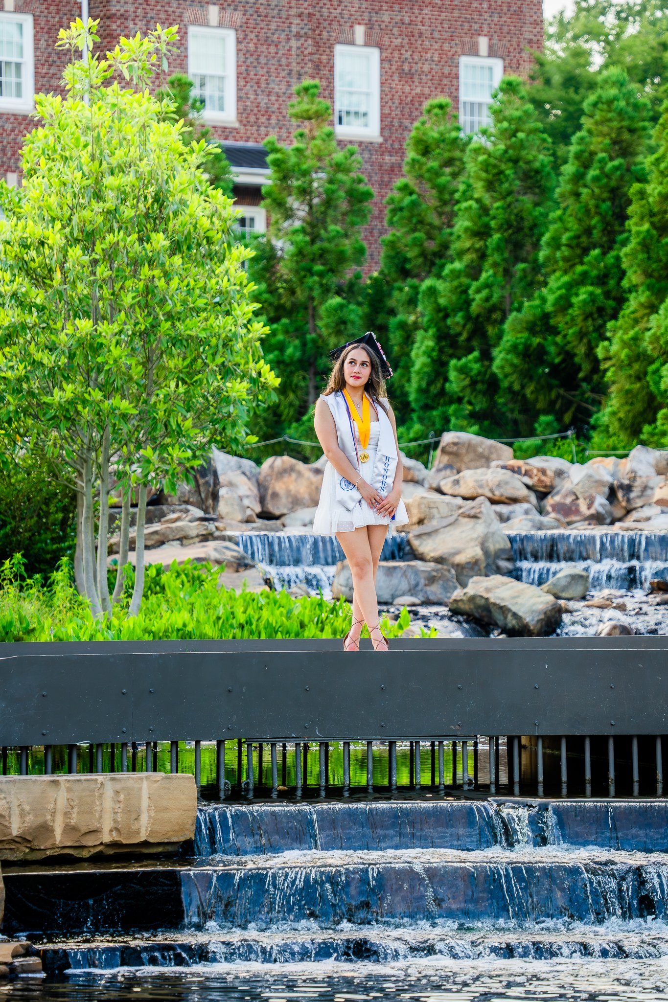 downtown-cary-park-graduation-session-waterfall-portrait.jpg