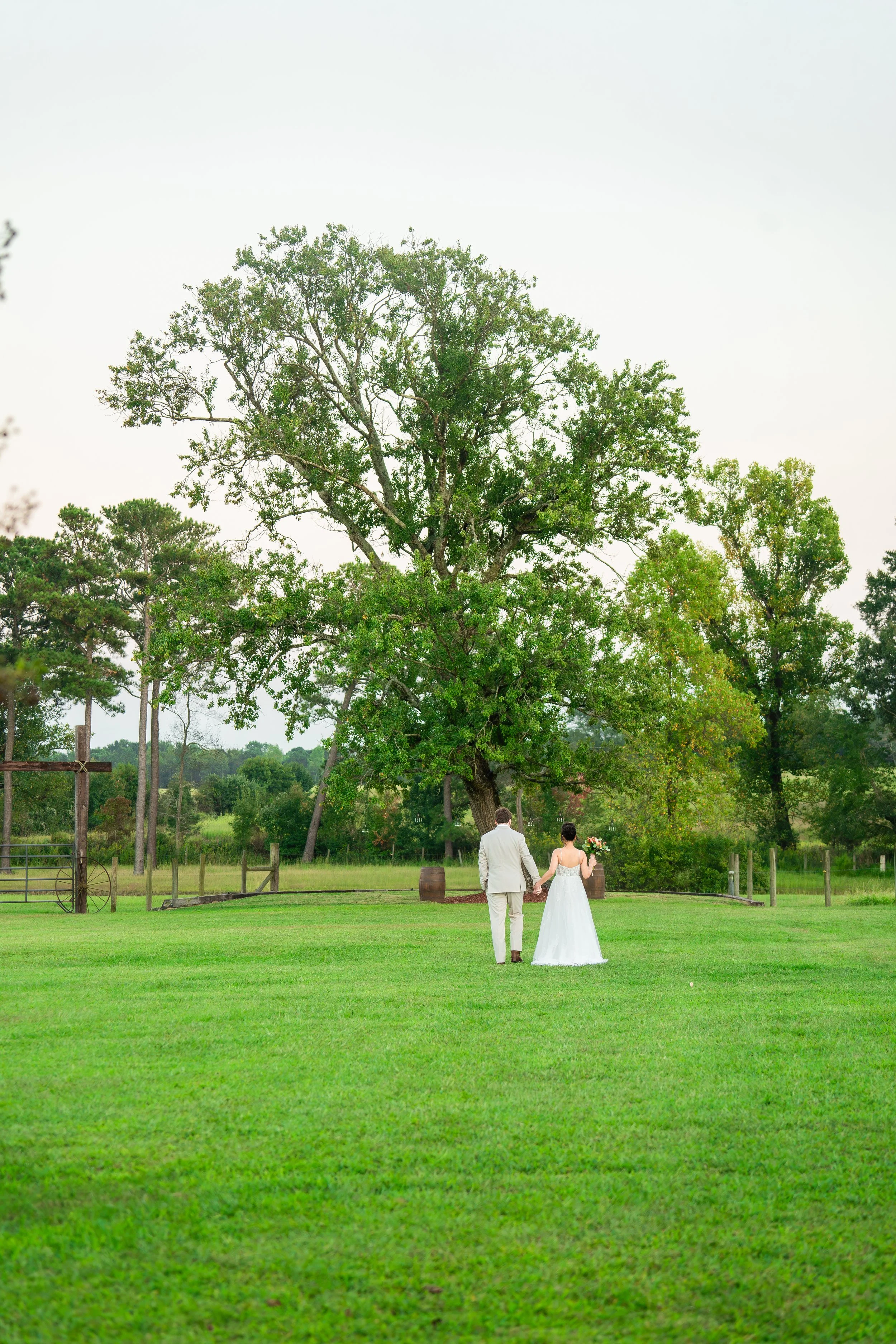 skyler-bride-portrait-walking-field-double-c-ranch-coats-nc.jpg
