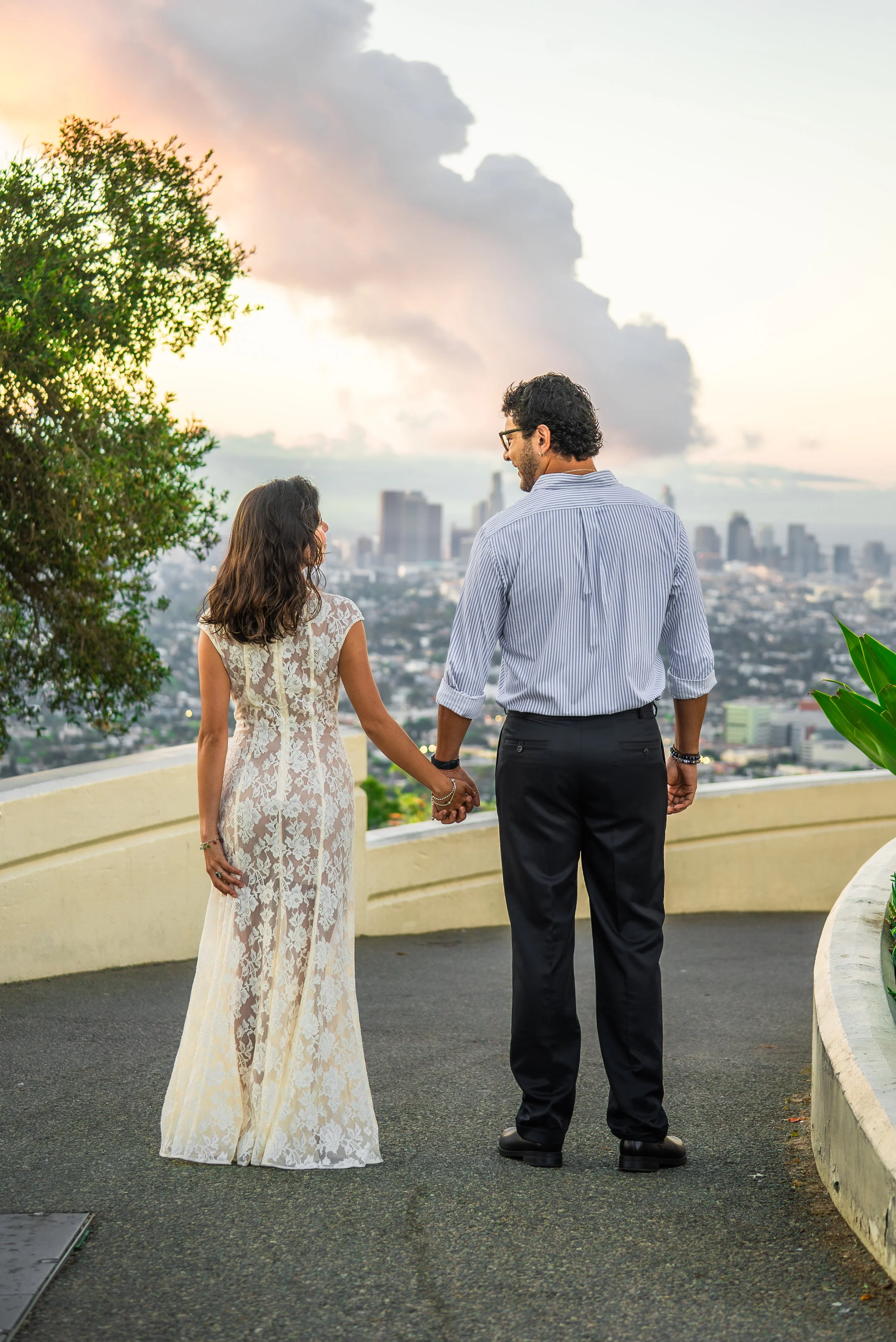 griffith-observatory-los-angeles-couples-session-holding-hands-overlook.jpg