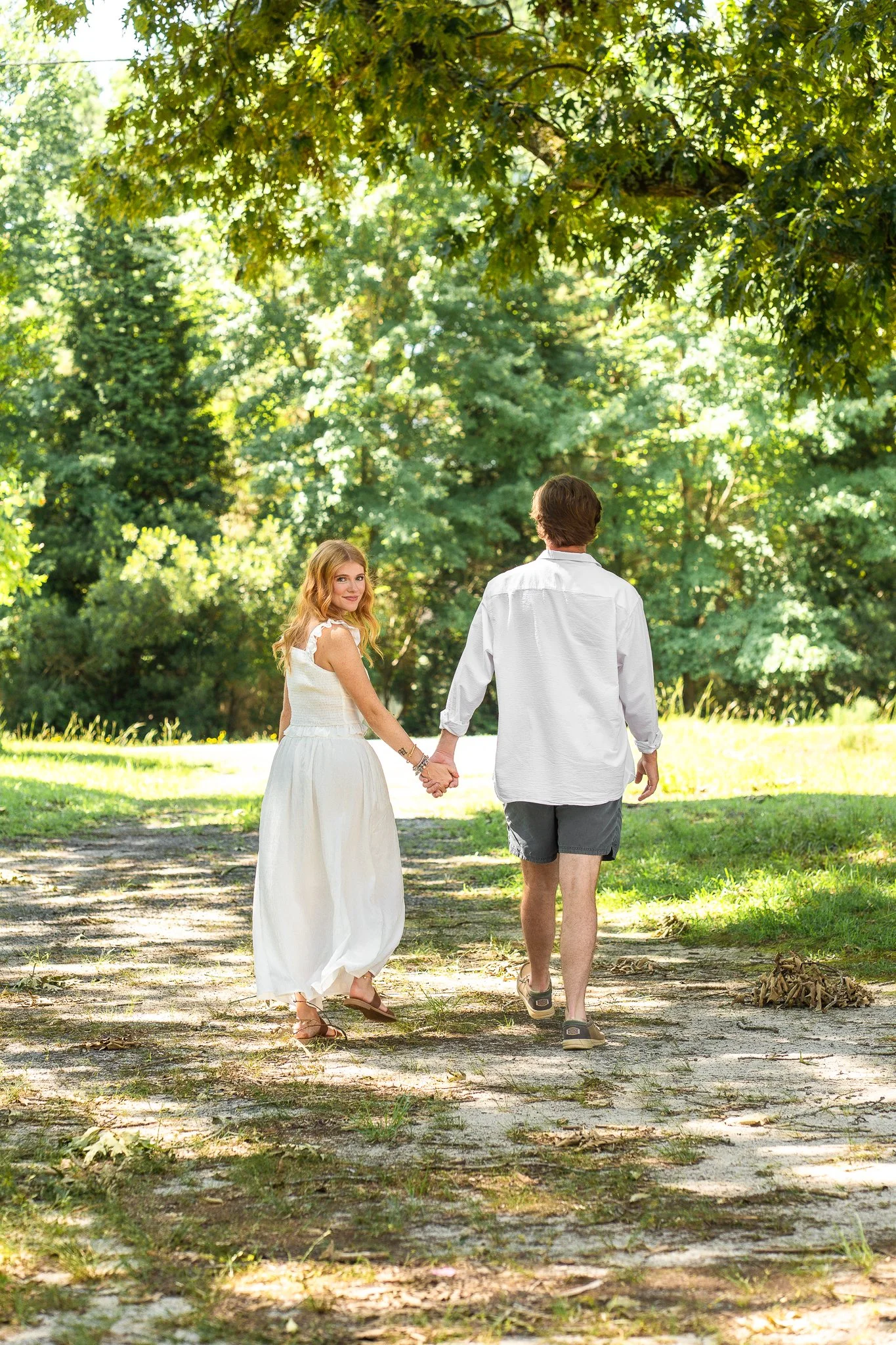clayton-nc-couples-photographer-backlit-walk.jpg
