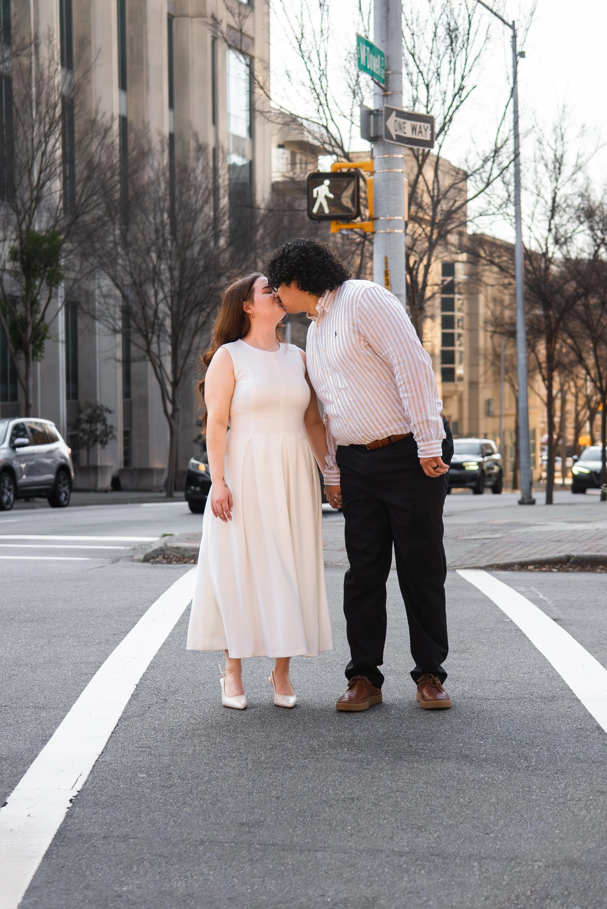 wake-county-justice-center-civil-wedding-raleigh-nc-crosswalk-kiss.jpg