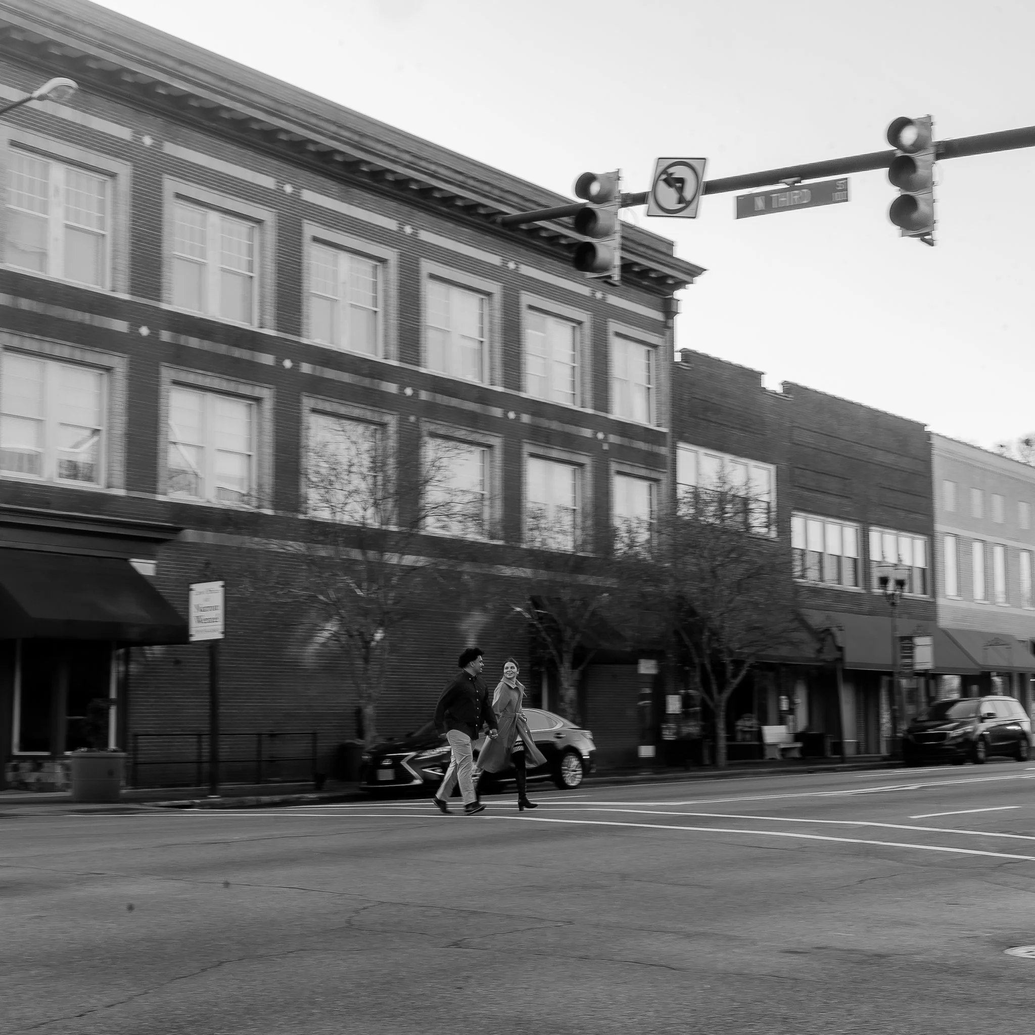 downtown-smithfield-nc-engagement-session-black-and-white-crosswalk.jpg