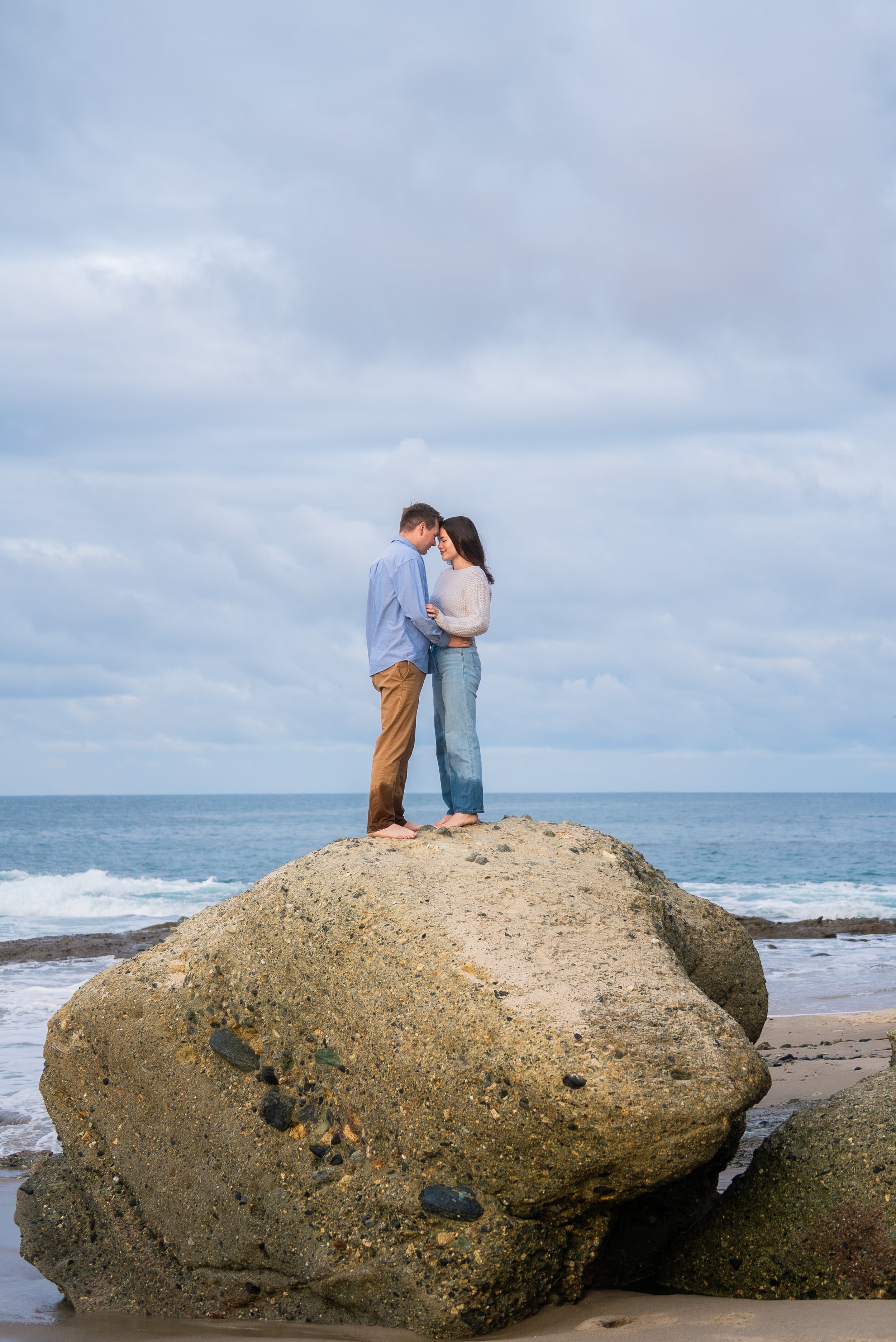 laguna-beach-couples-photographer-standing-on-rock.jpg