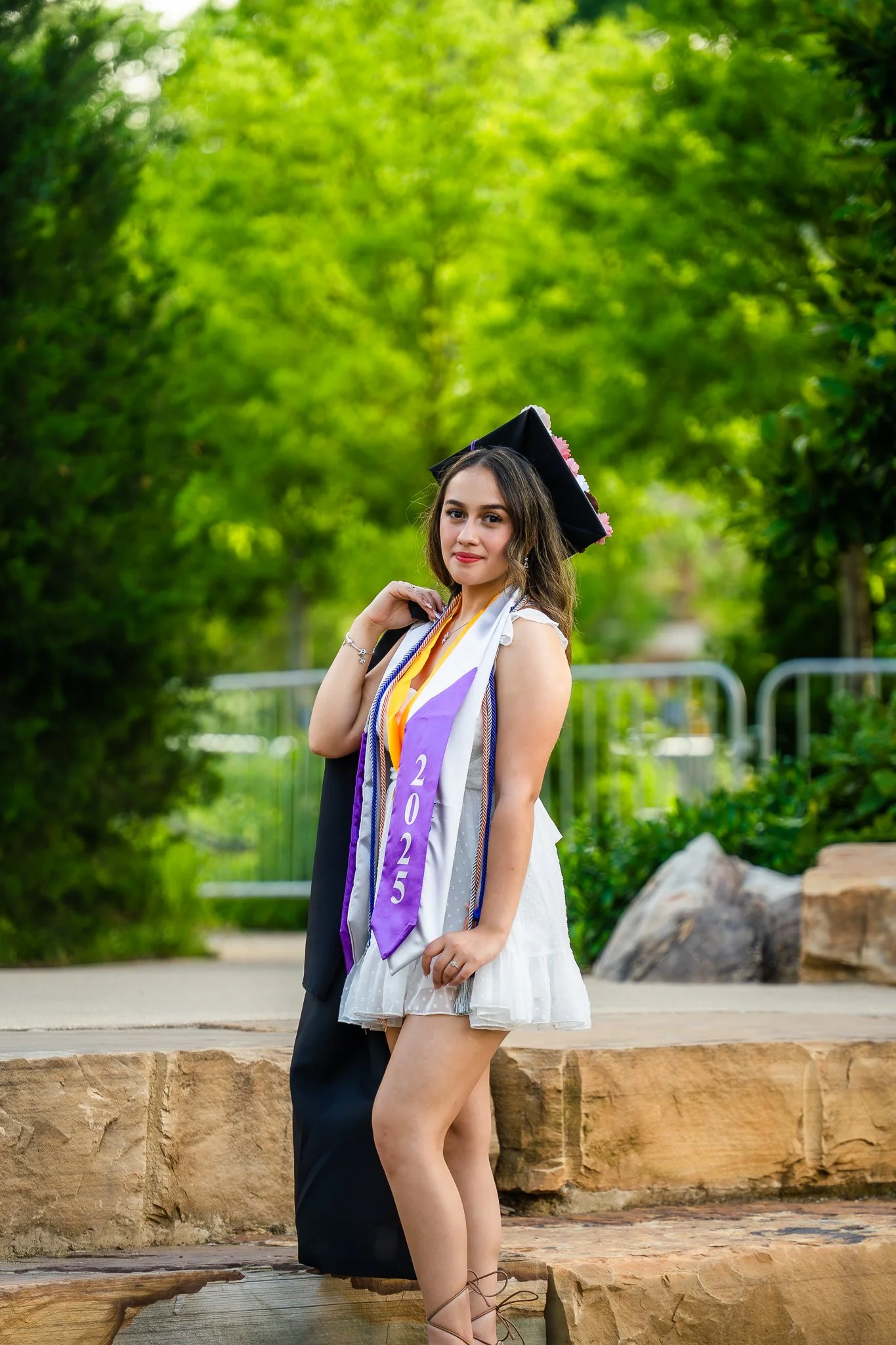 downtown-cary-park-graduation-session-cap-and-gown-standing.jpg