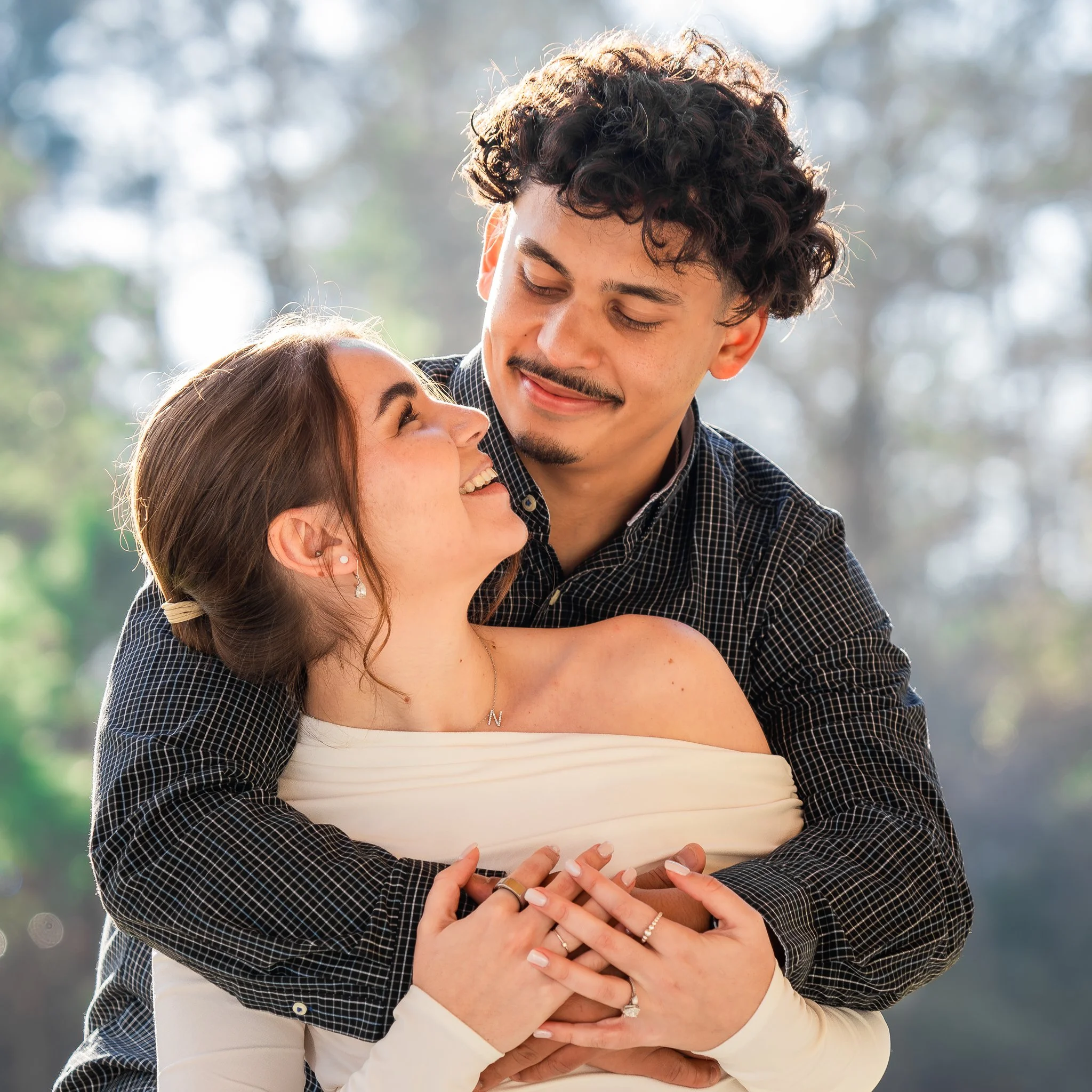 hartwood-wedding-venue-selma-nc-engagement-session-candid-embrace.jpg
