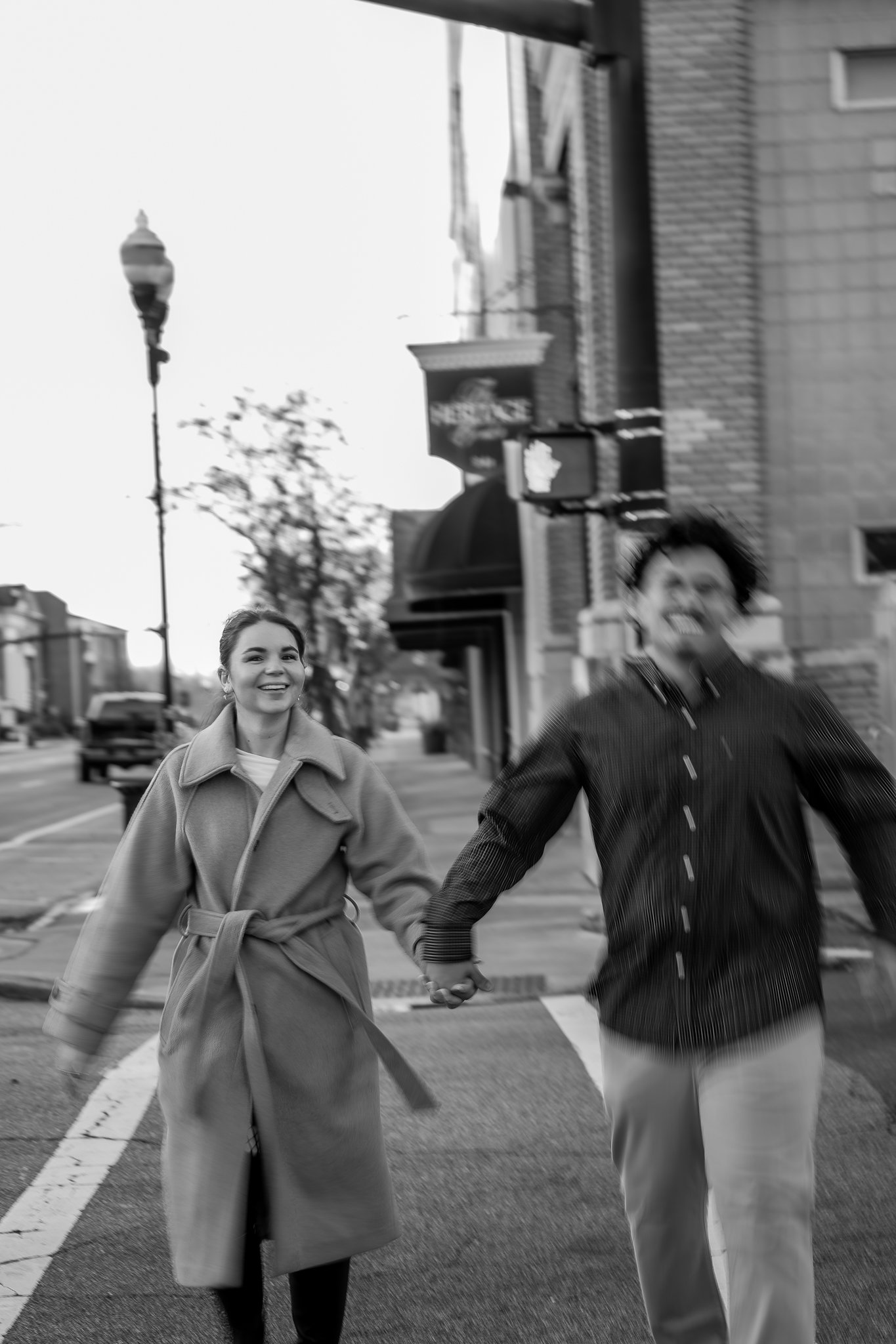 downtown-smithfield-nc-couples-session-black-and-white-walking.jpg