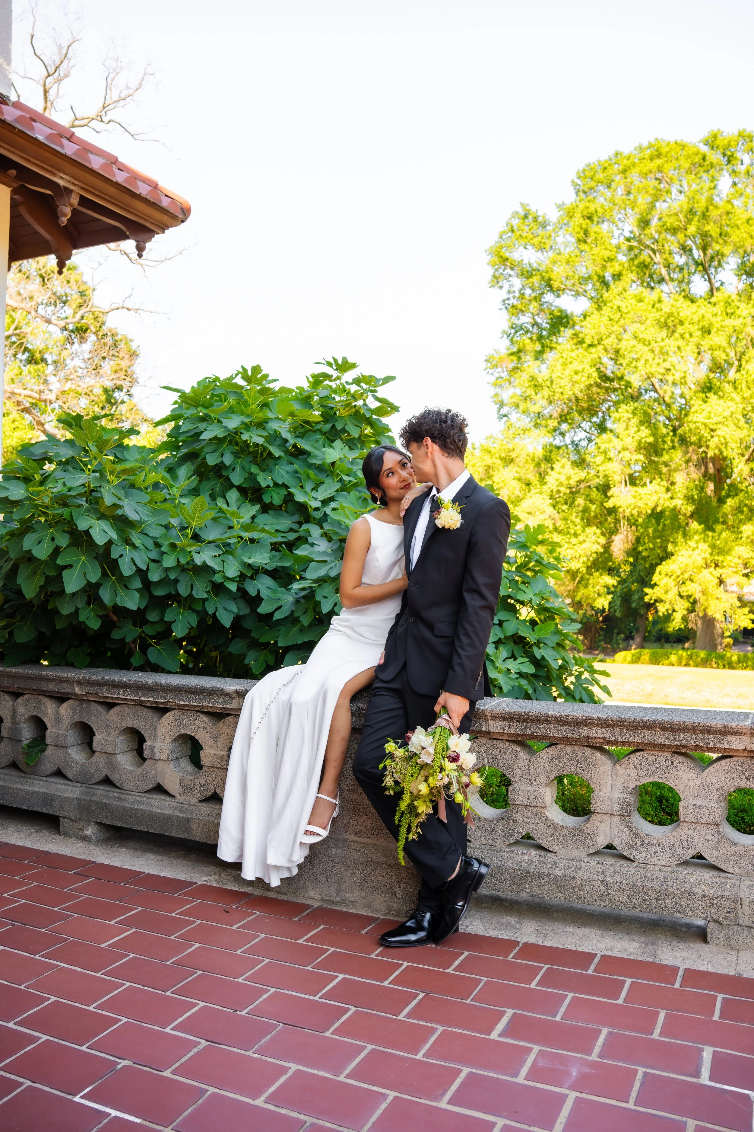 hill-house-durham-nc-wedding-terrace-kiss.jpg
