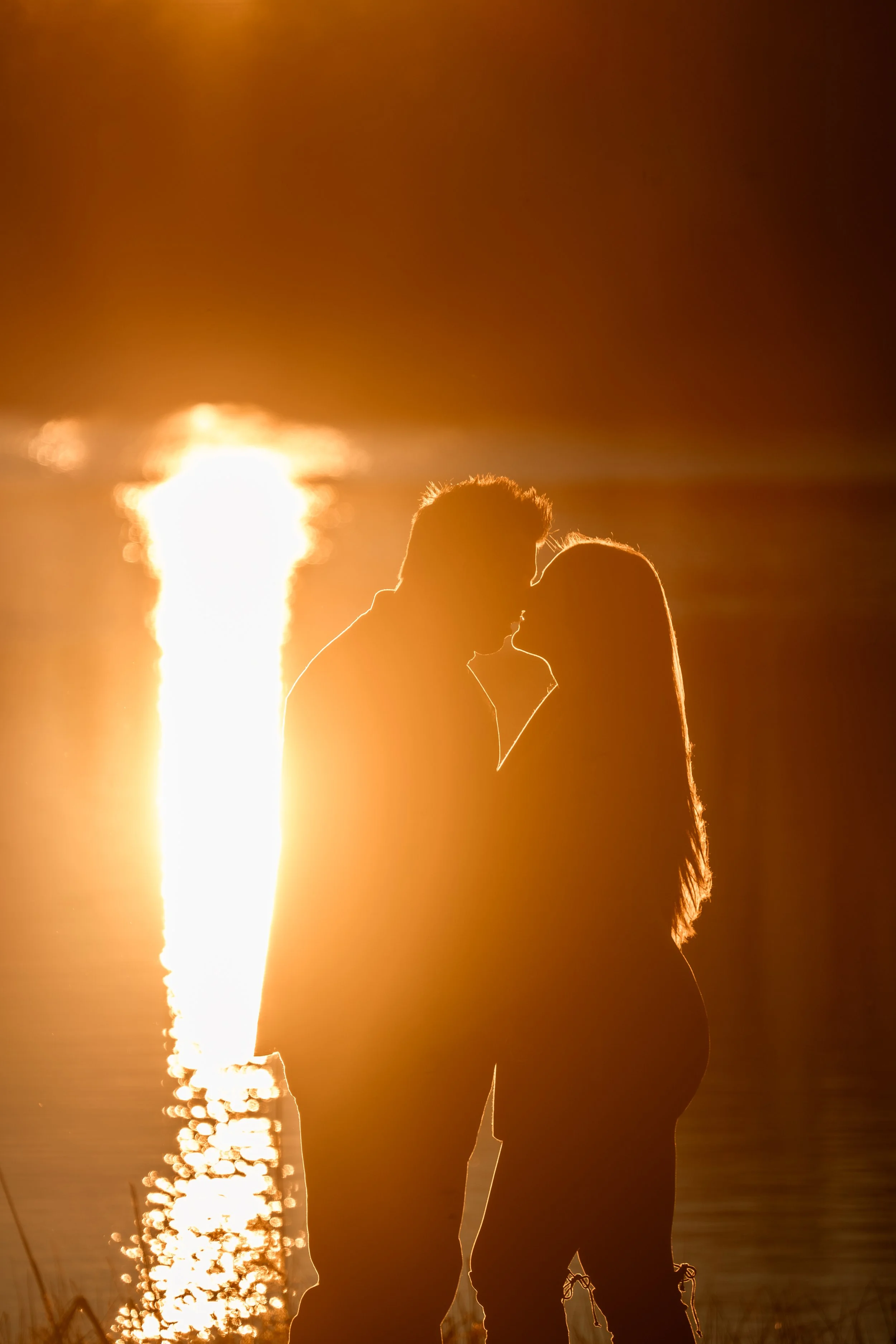 north-carolina-maternity-photographer-sunset-silhouette-couple.JPG
