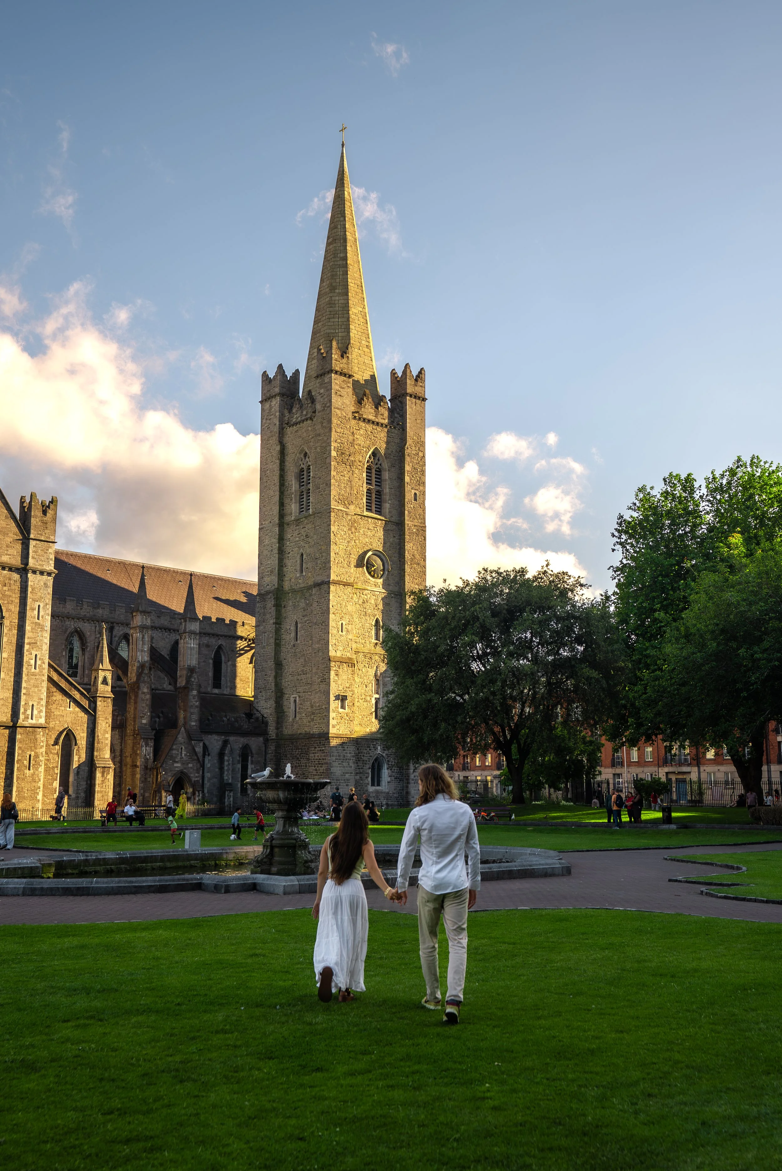 dublin-ireland-couples-photographer-walking-toward-cathedral.jpg