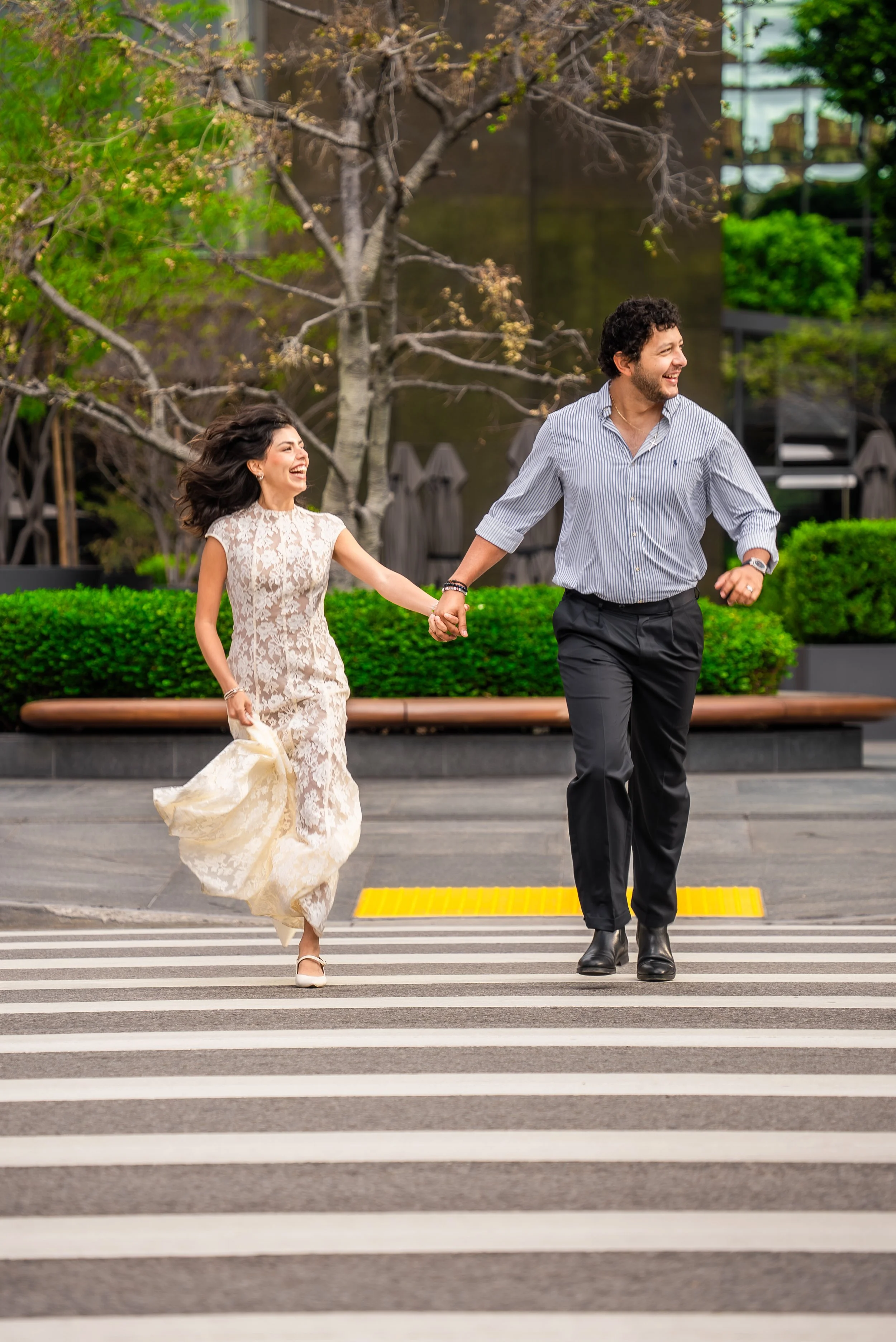 downtown-los-angeles-couples-session-running-across-crosswalk.jpg