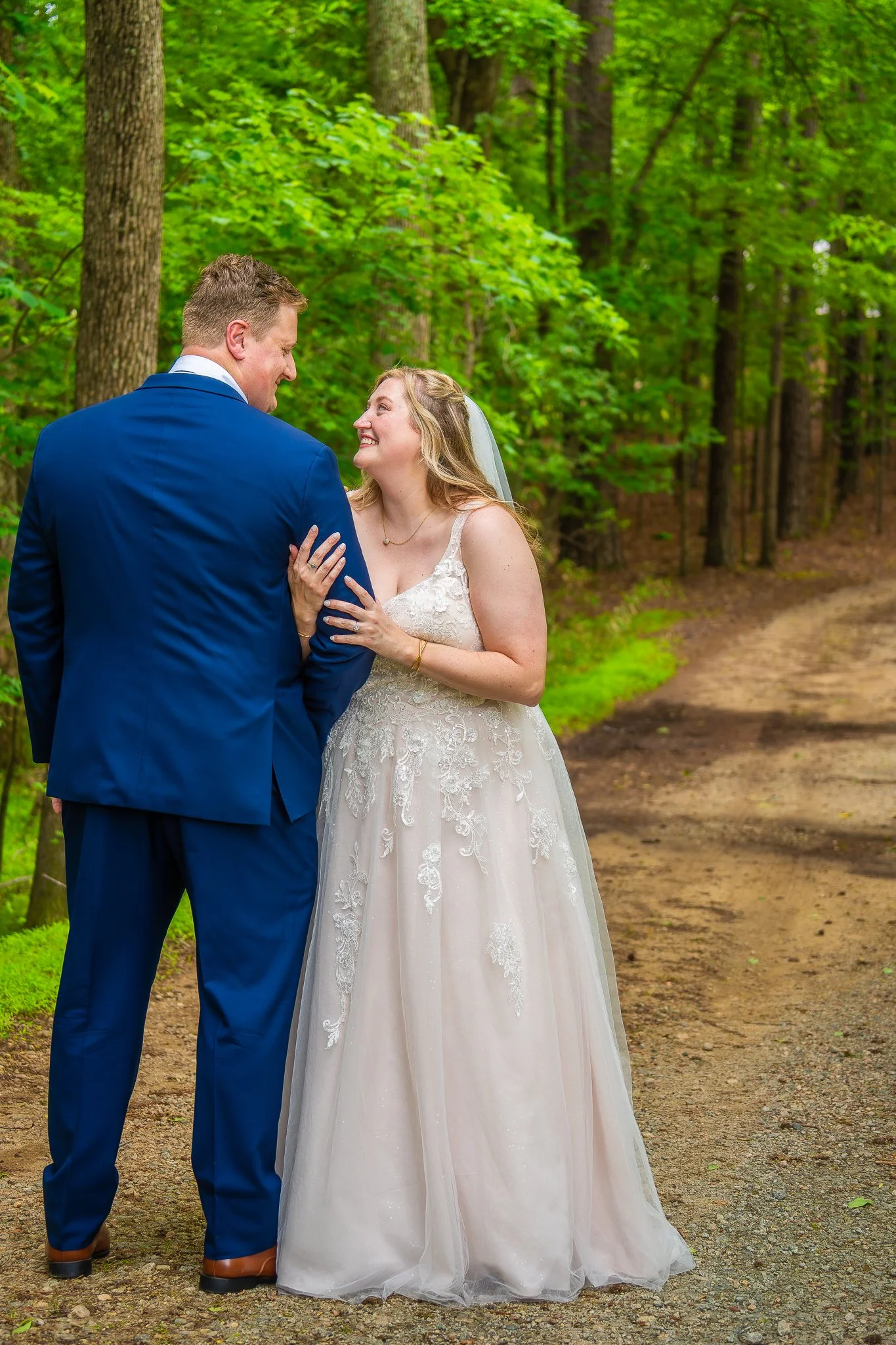april-john-wedding-couple-back-view-forest-mini-acre-farms-raleigh-nc.jpg