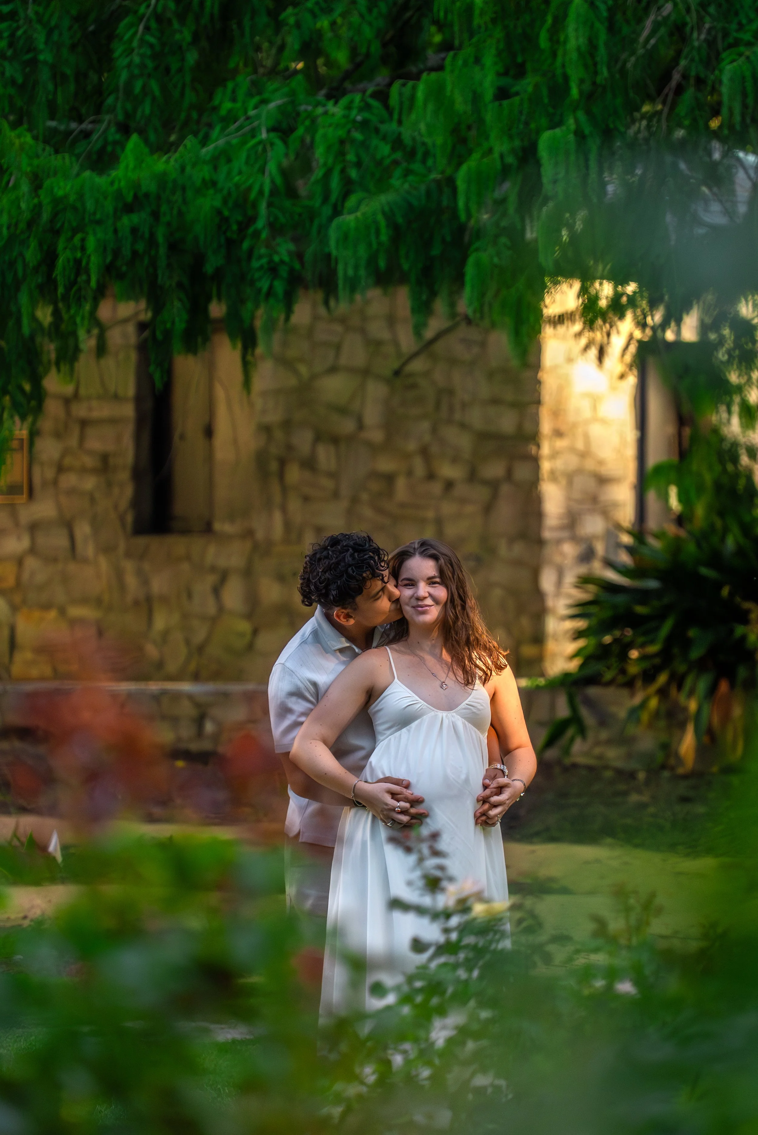 raleigh-rose-garden-raleigh-nc-maternity-session-standing-embrace.jpg