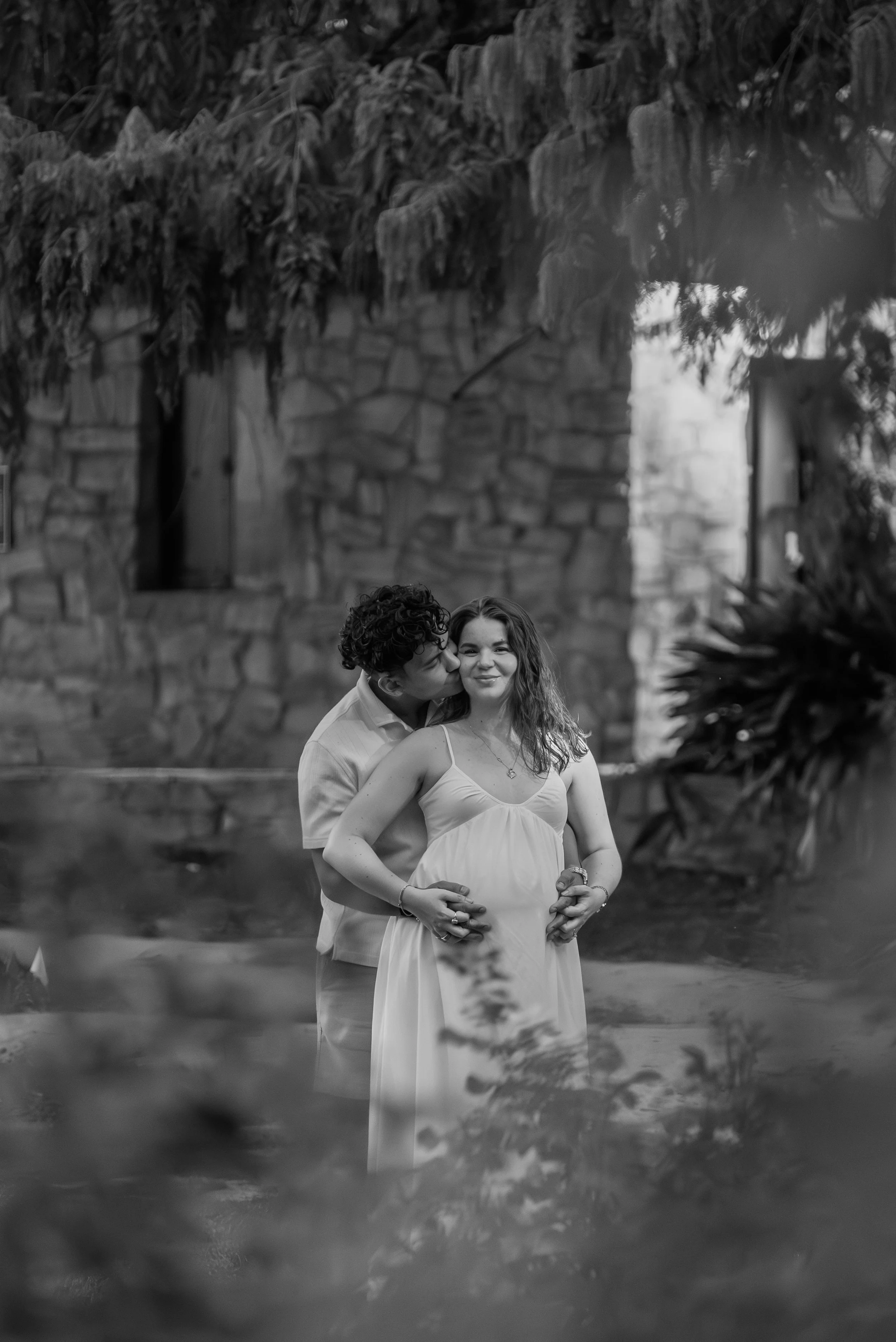 raleigh-rose-garden-raleigh-nc-maternity-session-black-and-white-embrace.jpg