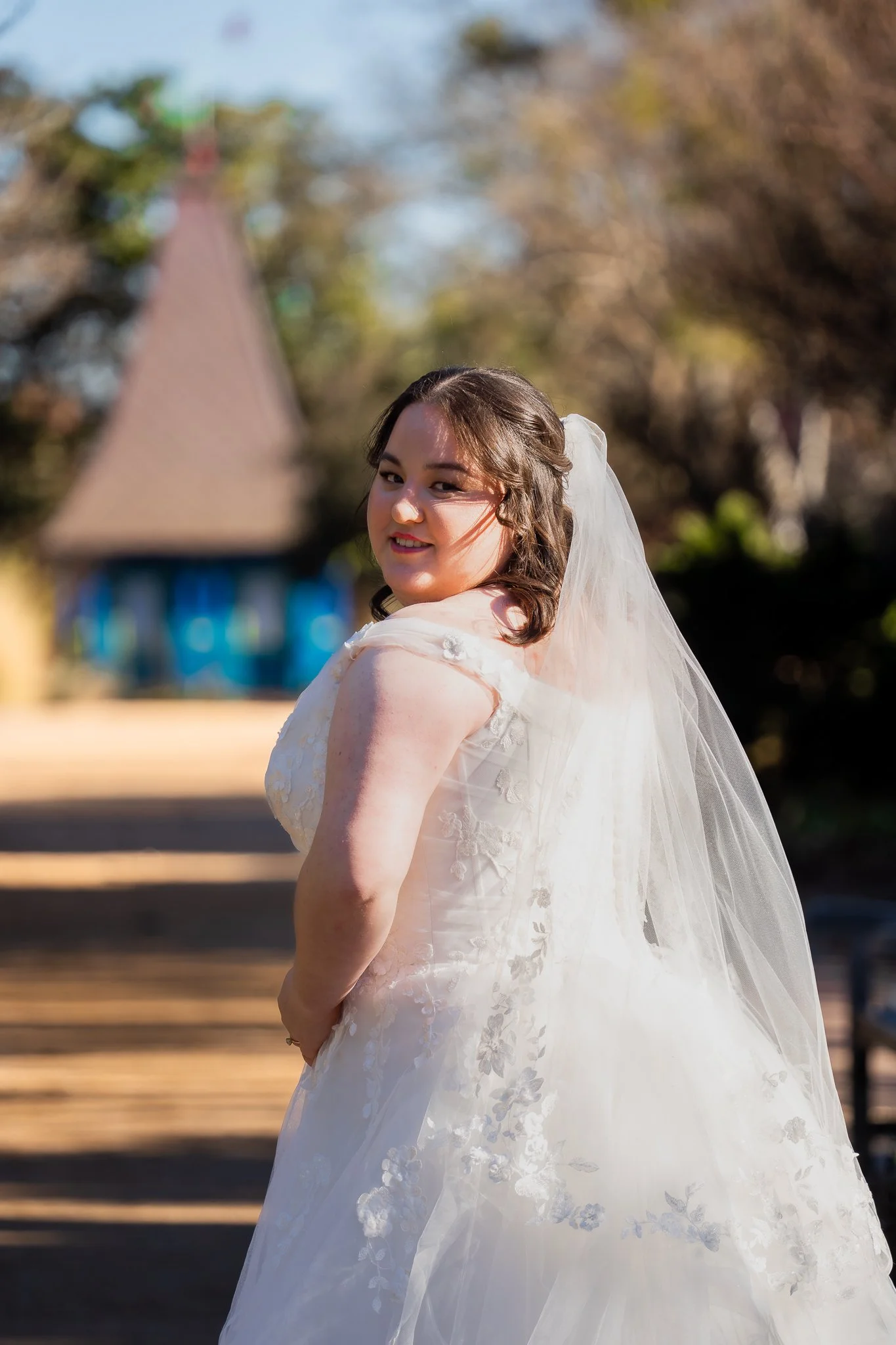 jc-raulston-arboretum-raleigh-nc-bridal-portraits-over-the-shoulder.jpg