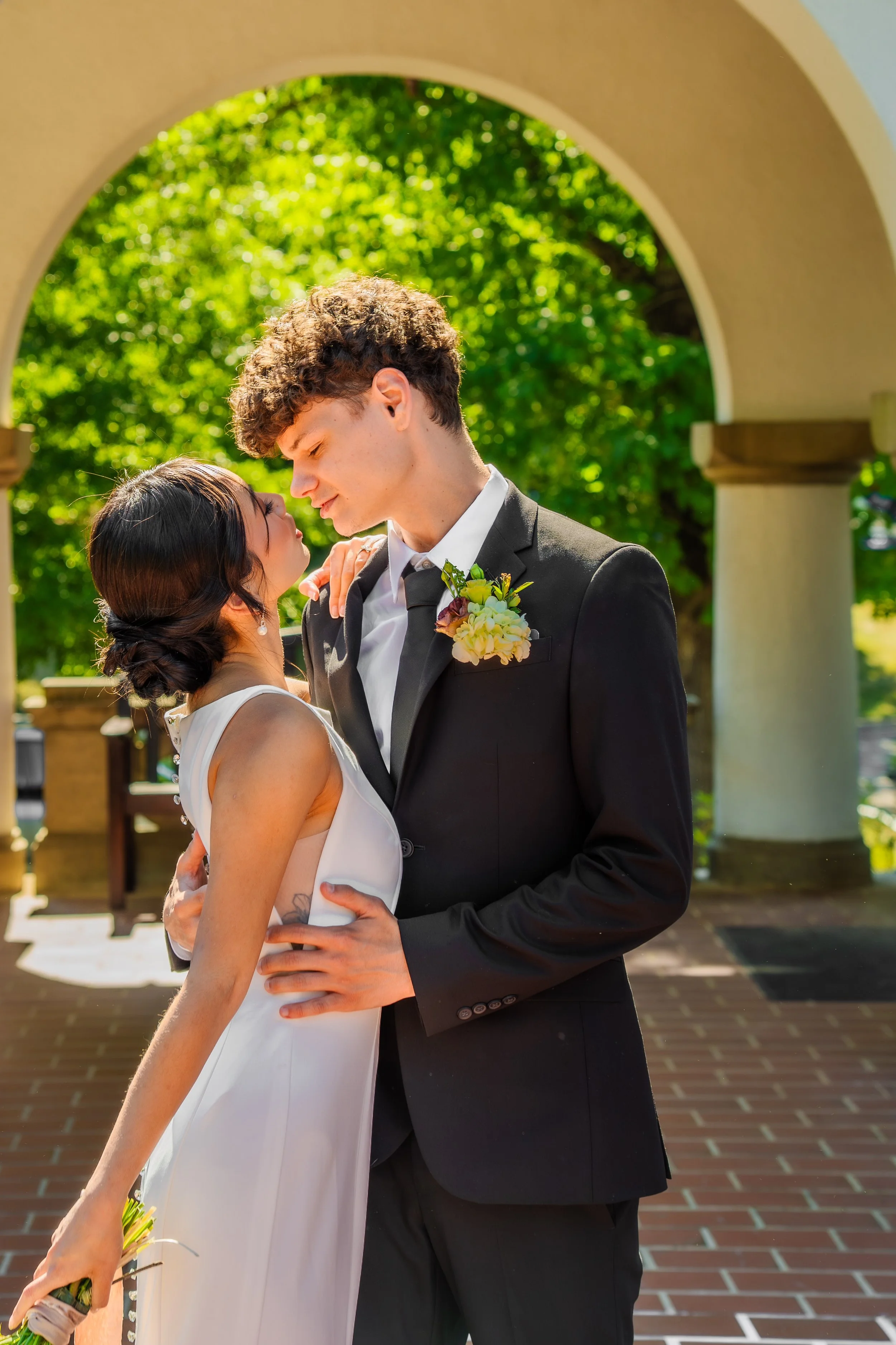 hill-house-durham-nc-wedding-archway-embrac.jpg