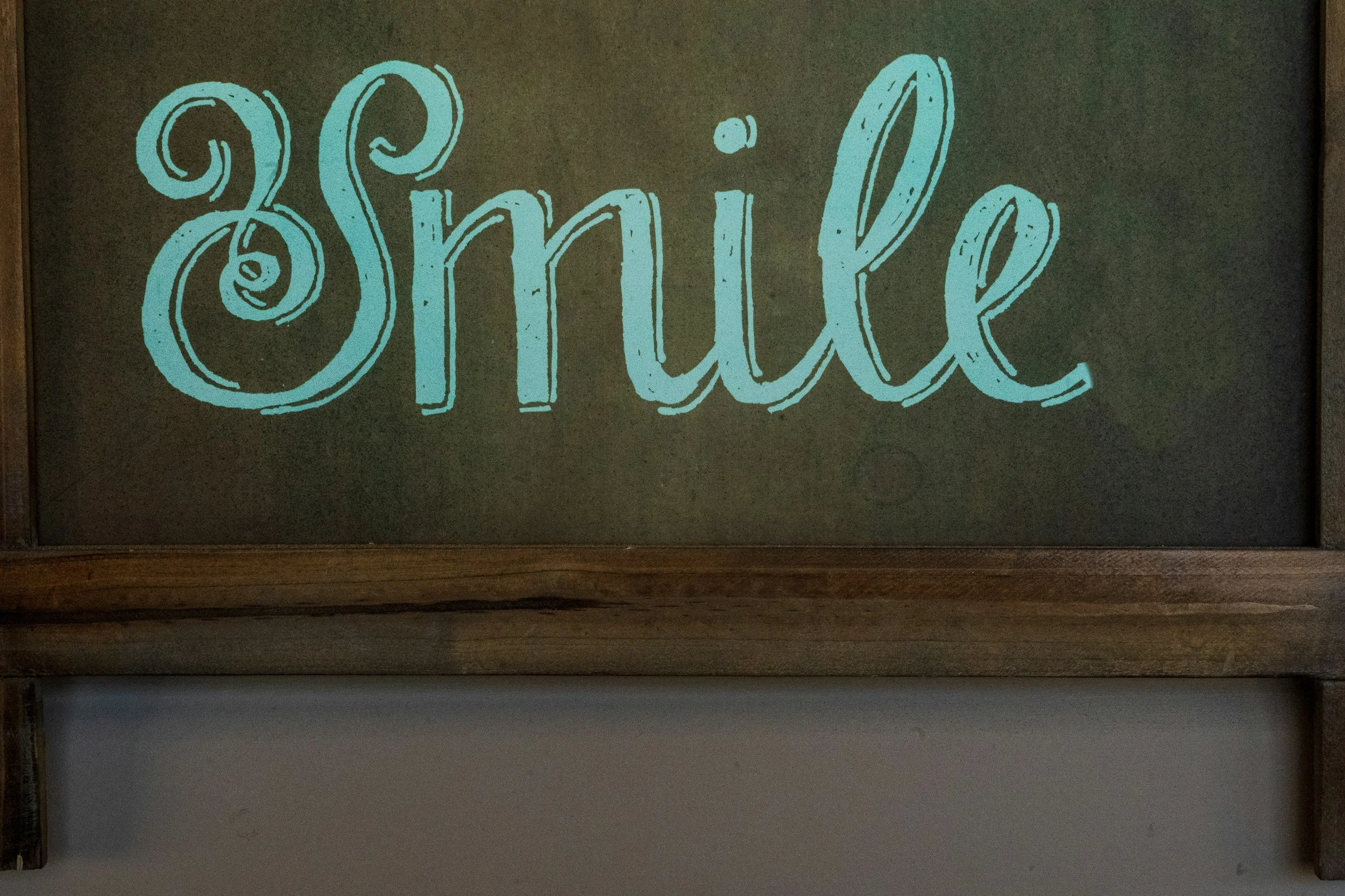 Blue Lettering of the word "Smile"