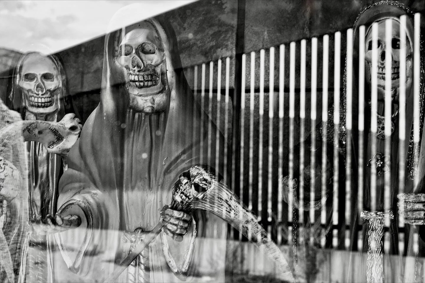 Santa Muerte at the border Wall. Santa Muerte is believed to be the patron saint of the cartel. #santamuerte #diademuertos☠️ #borderwall #usmexicoborderwall #lauriesmithphoto