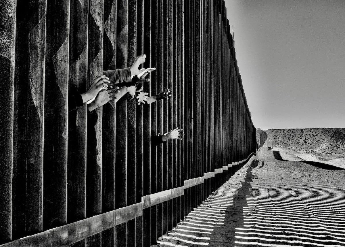 Hands Through the Wall_Anapra, NM 2018_Laurie Smith.jpeg