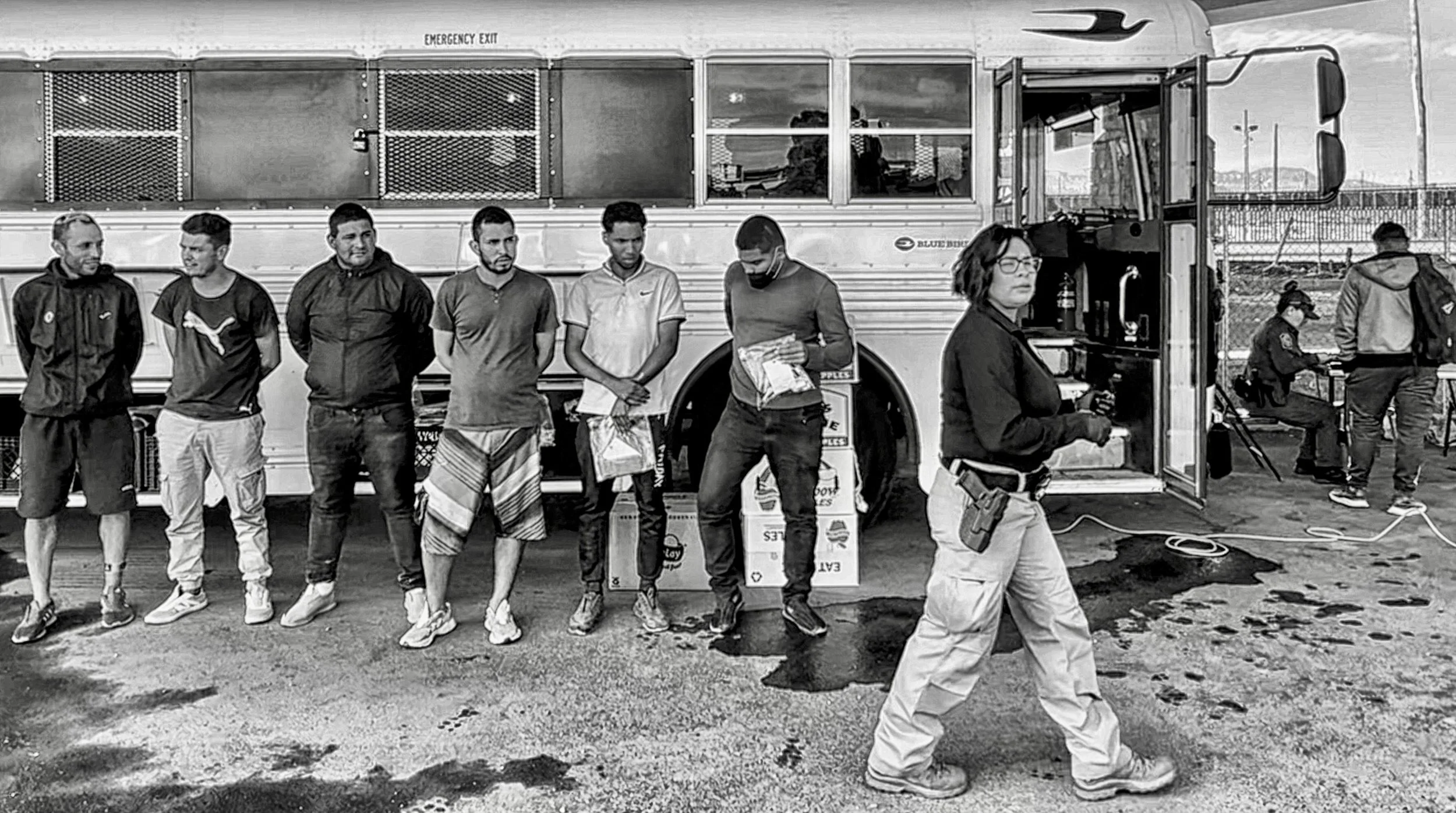 Detained Asylum Seekers Lined up at Bus_El Paso, TX 2022.jpeg