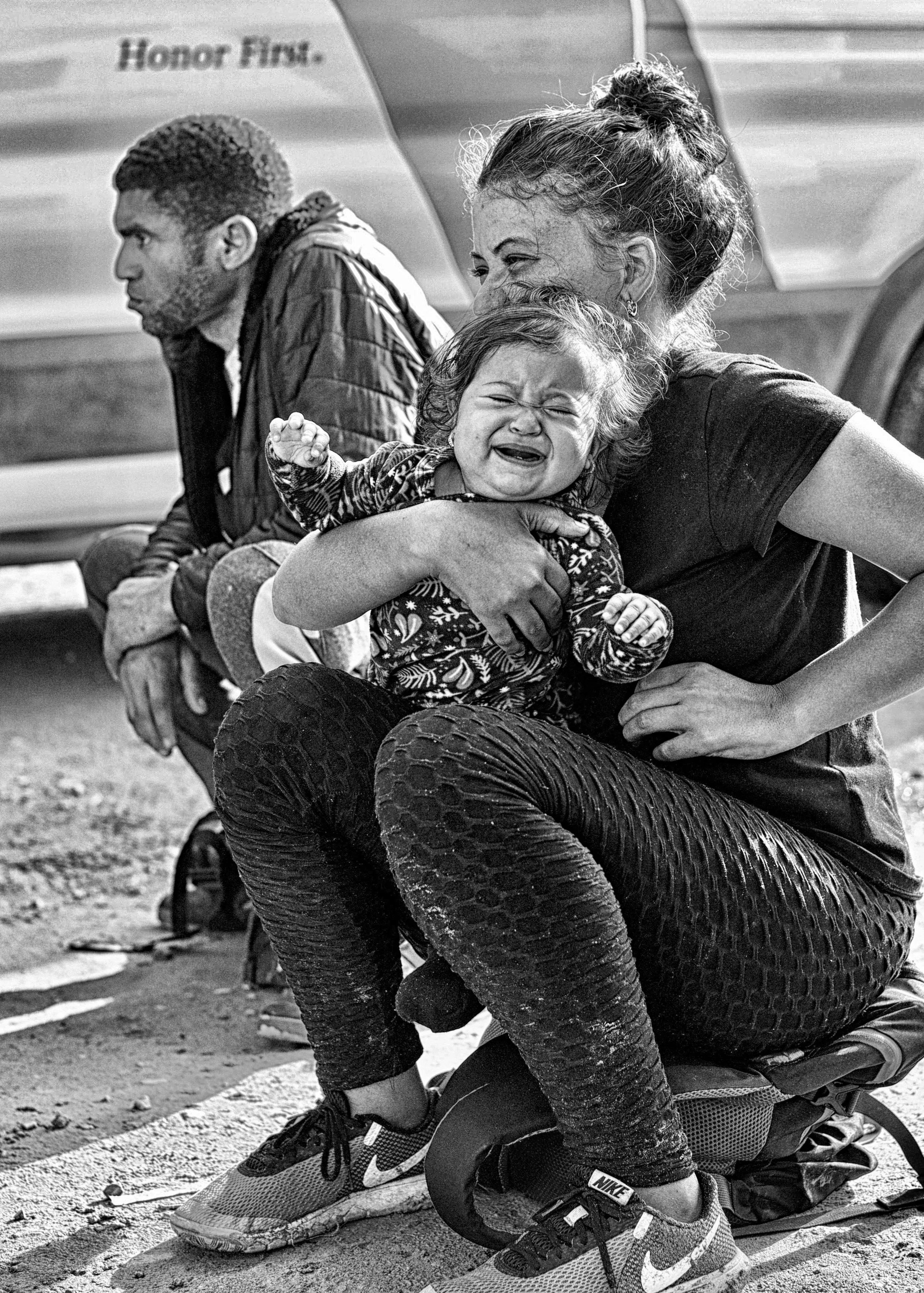 Venezuelan Family with Crying Baby Seeking Asylum_El Paso, TX 2022.jpeg