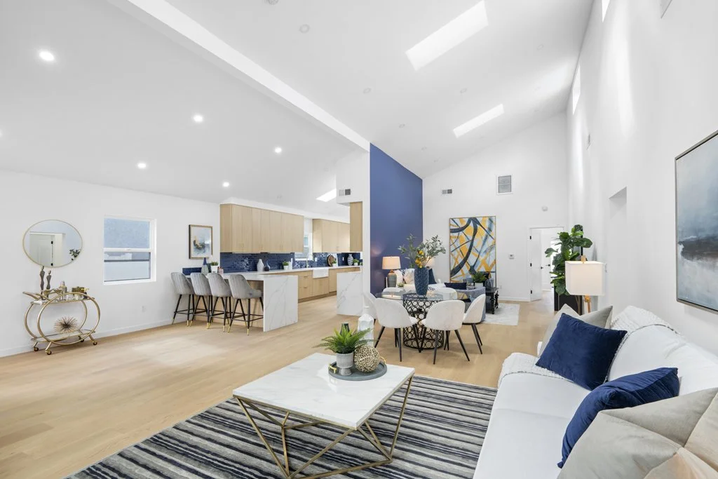 Affordable real estate photography of an open-concept living room and kitchen – modern interior staging captured in Los Angeles by Intuition Real Estate Photography & Imaging.