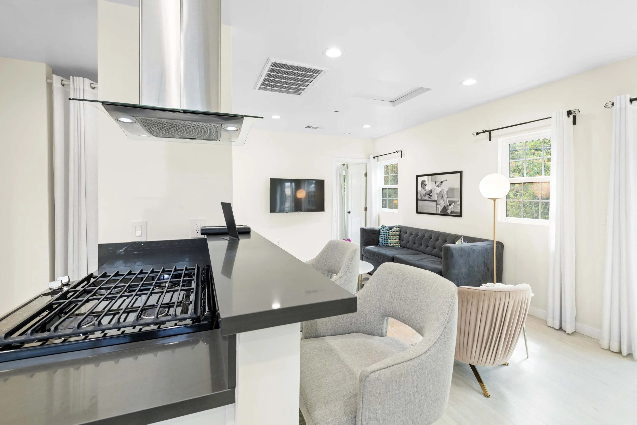 Best open-concept staging in Los Angeles – kitchen island and styled living space captured by Intuition Real Estate Photography & Imaging for high-converting real estate marketing.