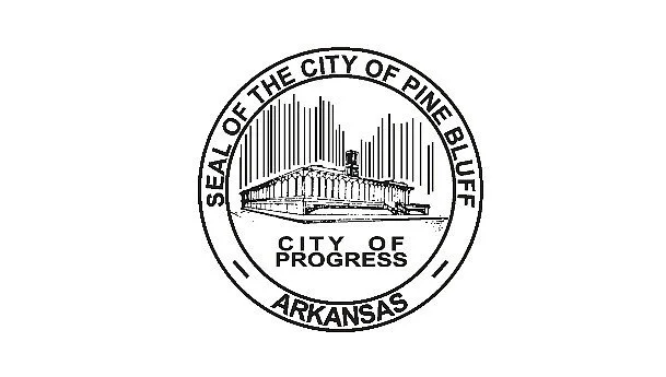 Seal of the City of Pine Bluff, Arkansas, featuring an illustration of a government building with the words 'City of Progress'.