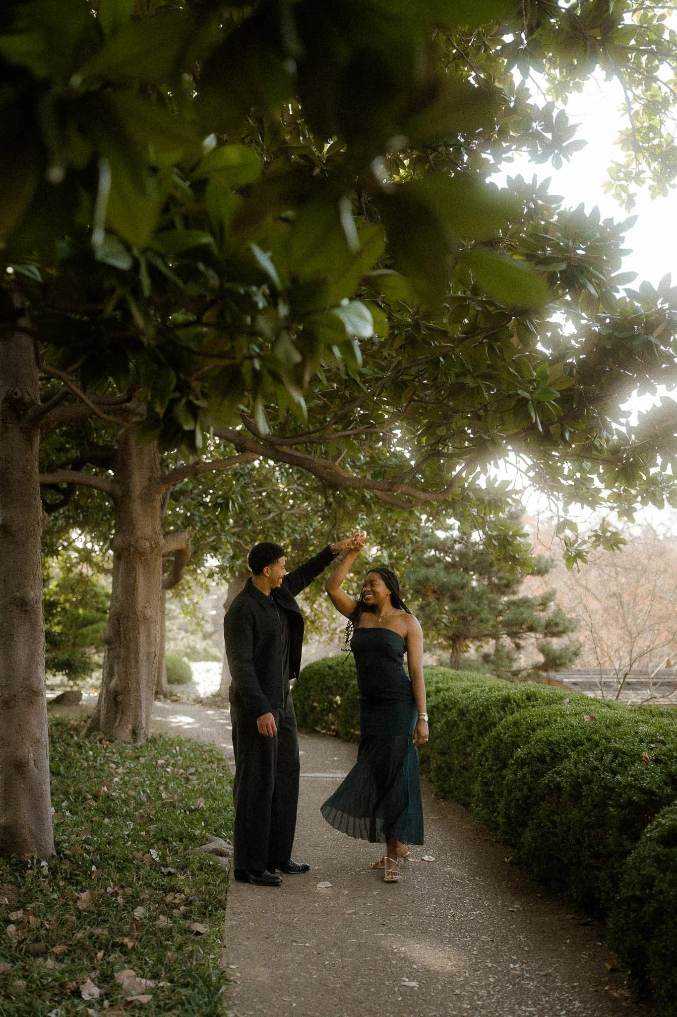 couple-dancing-under-magnolia-trees.jpg