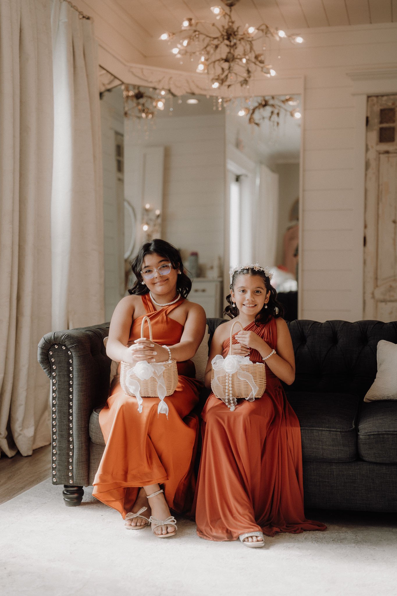 flower-girls-rust-dresses-chandelier-farms.jpg