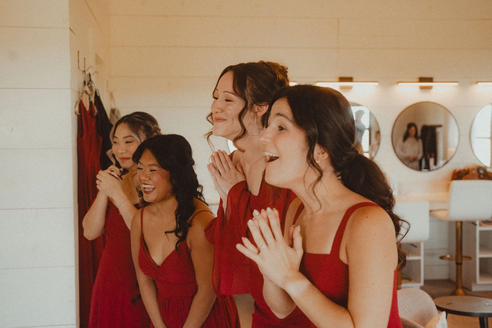 bridesmaids-red-dresses-reaction.jpg