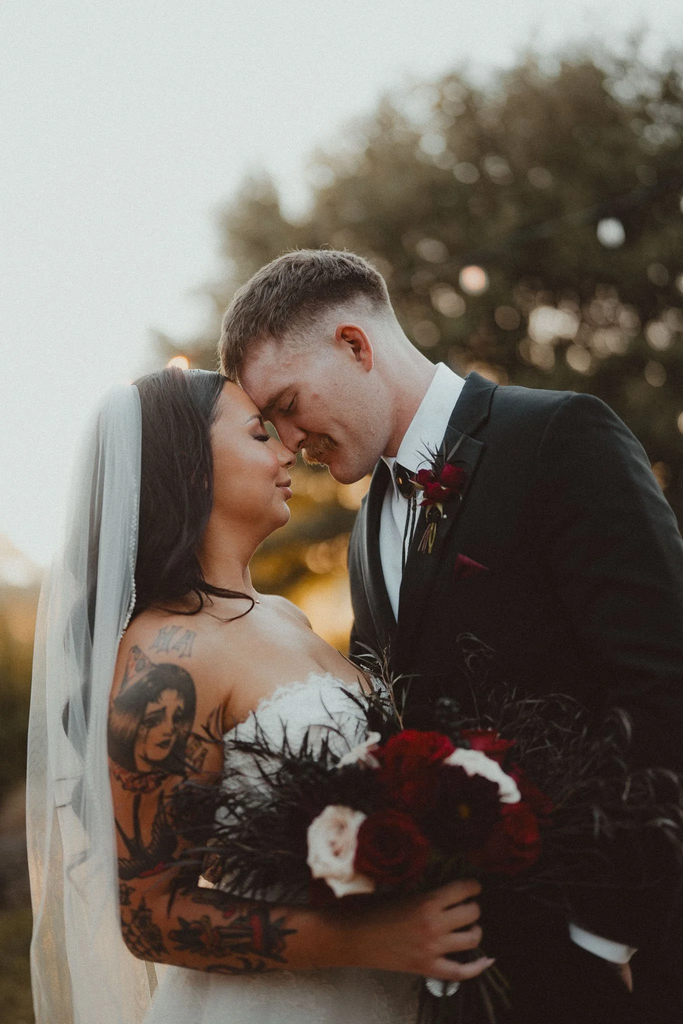 romantic-forehead-to-forehead-wedding-portrait.jpg