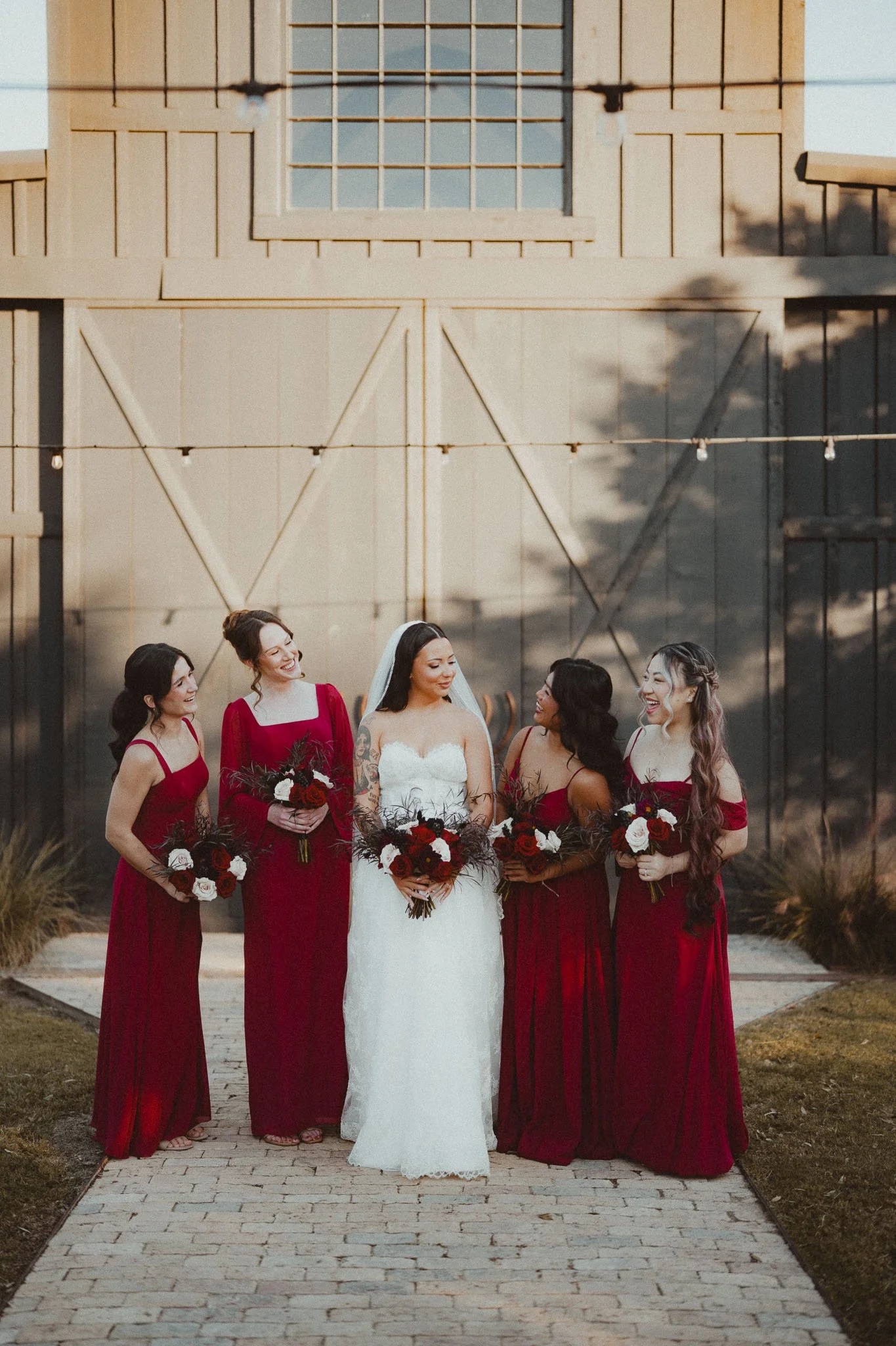 bride-and-bridesmaids-red-dresses-portraits.jpg