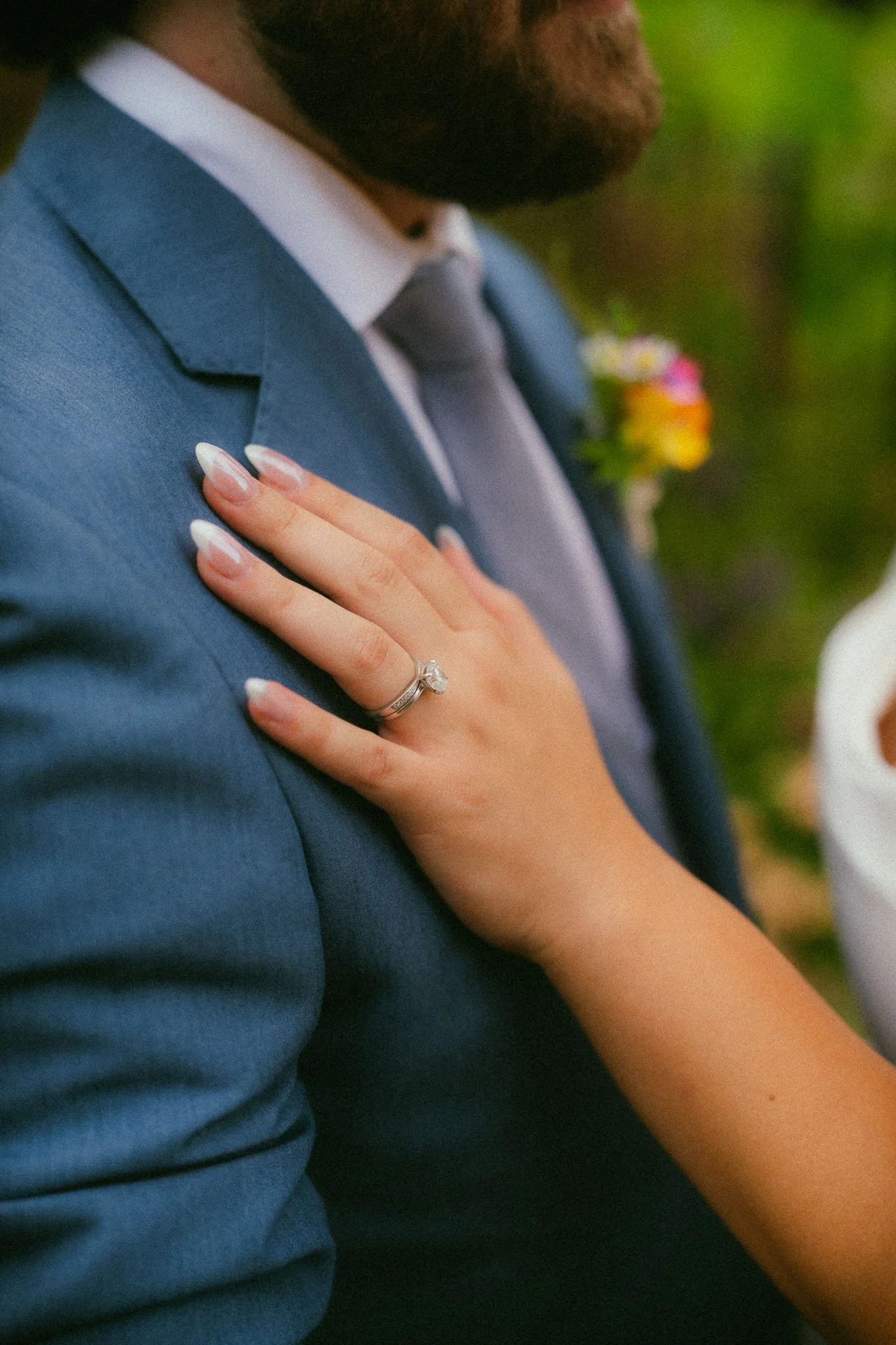 diamond-engagement-ring-detail-blue-suit.jpg