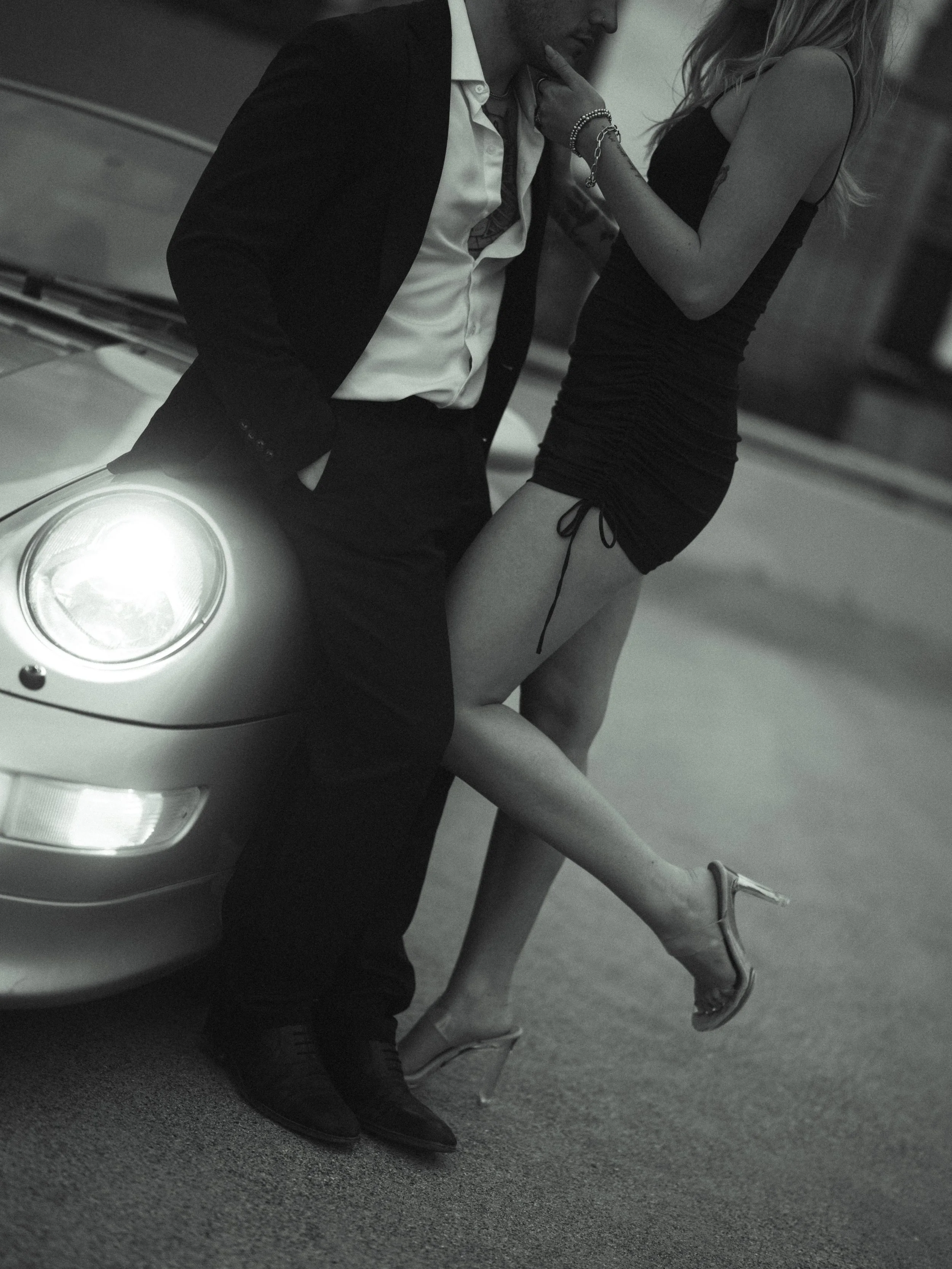 cinematic-black-and-white-close-up-couple-car-headlight.jpg