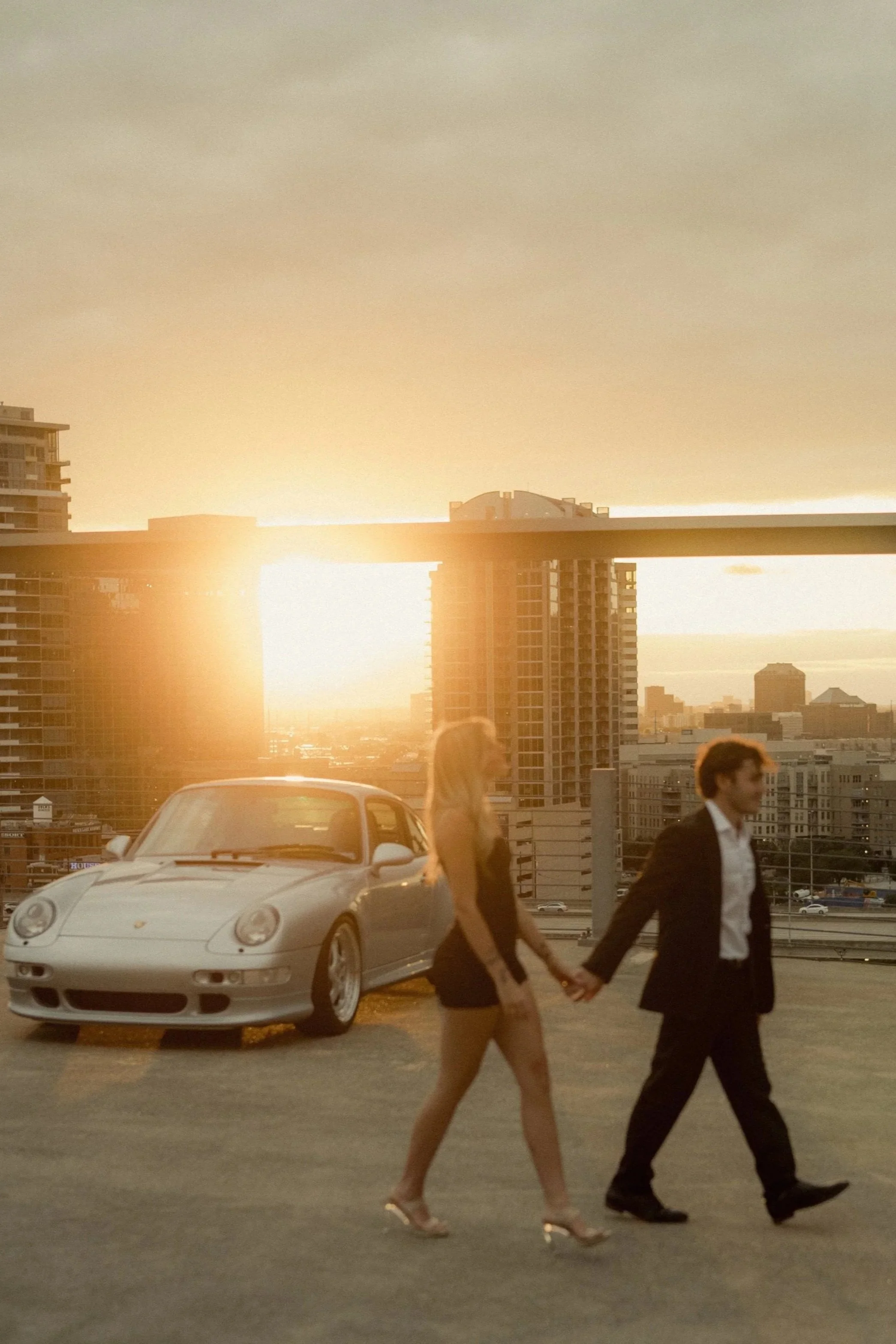 Golden Hour in Downtown Dallas: Meagan and Nitro’s Cinematic Rooftop Engagement Session