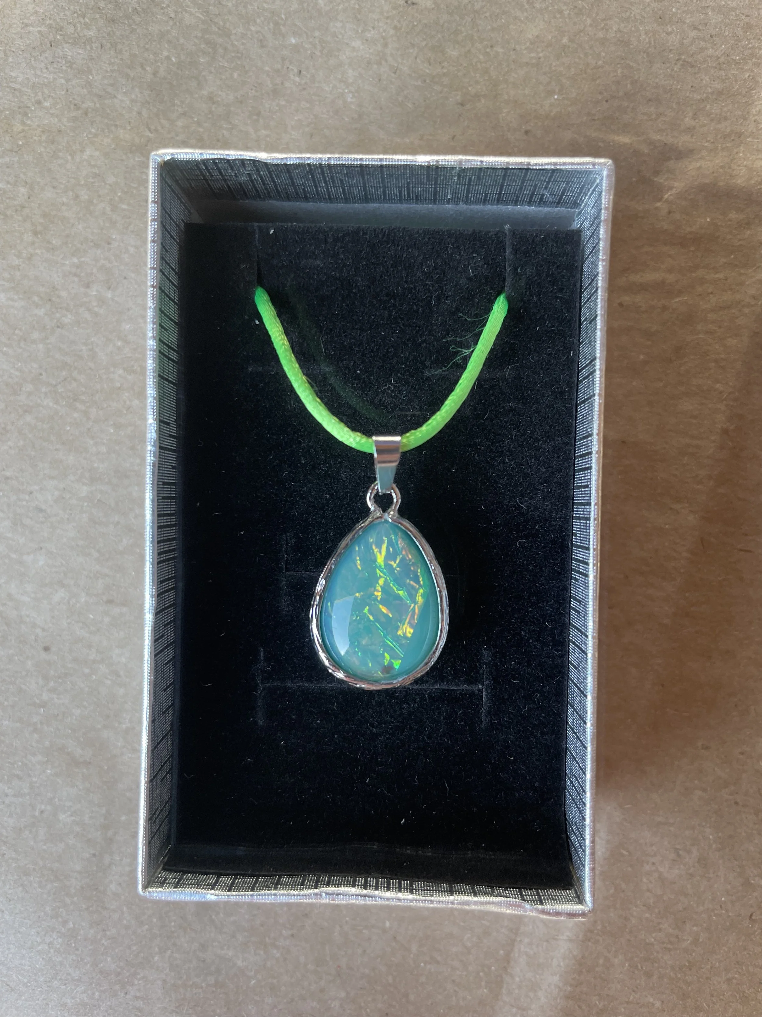 Opal Ice Pendant Blue on Bright Green Cord.jpg