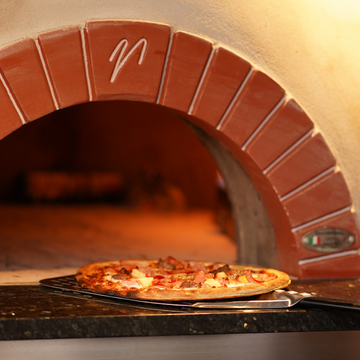 Wood-fired pizza oven at Taja Brasserie, Shoalhaven Heads Bowling Club