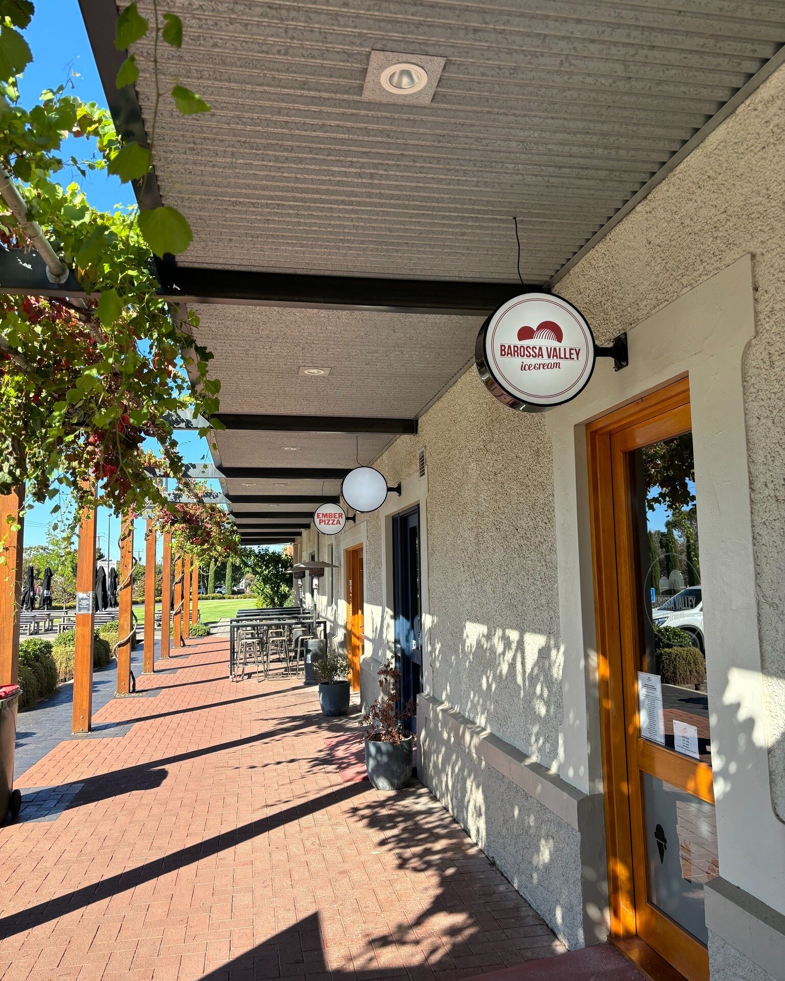 It's a beautiful day at Provenance! ☀️ Why not pop into @barossa_valley_ice_cream for an after-school treat? Or swing by @barossadistillingco or @steinstaphouse for a cheeky knockoff drink? Either way, don't forget to check out our new signage while 