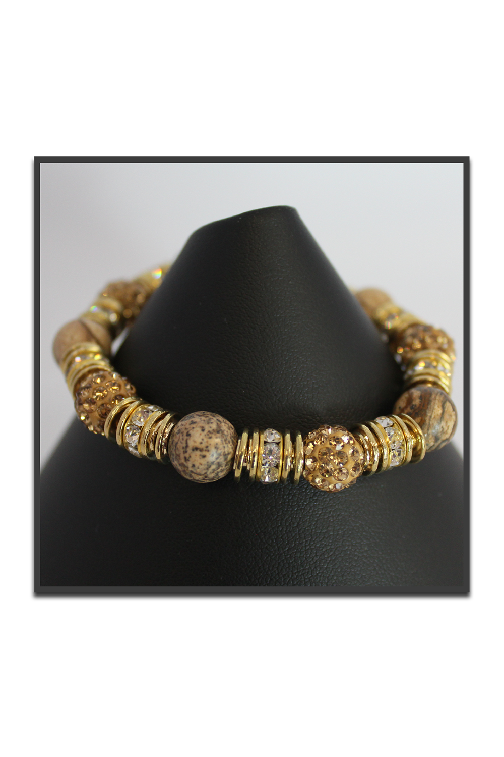Stretch Bracelet. Glass Rhinestone. Gold Finish. Gold, Champagne, & Clear Color. 6 ½" H20-8188