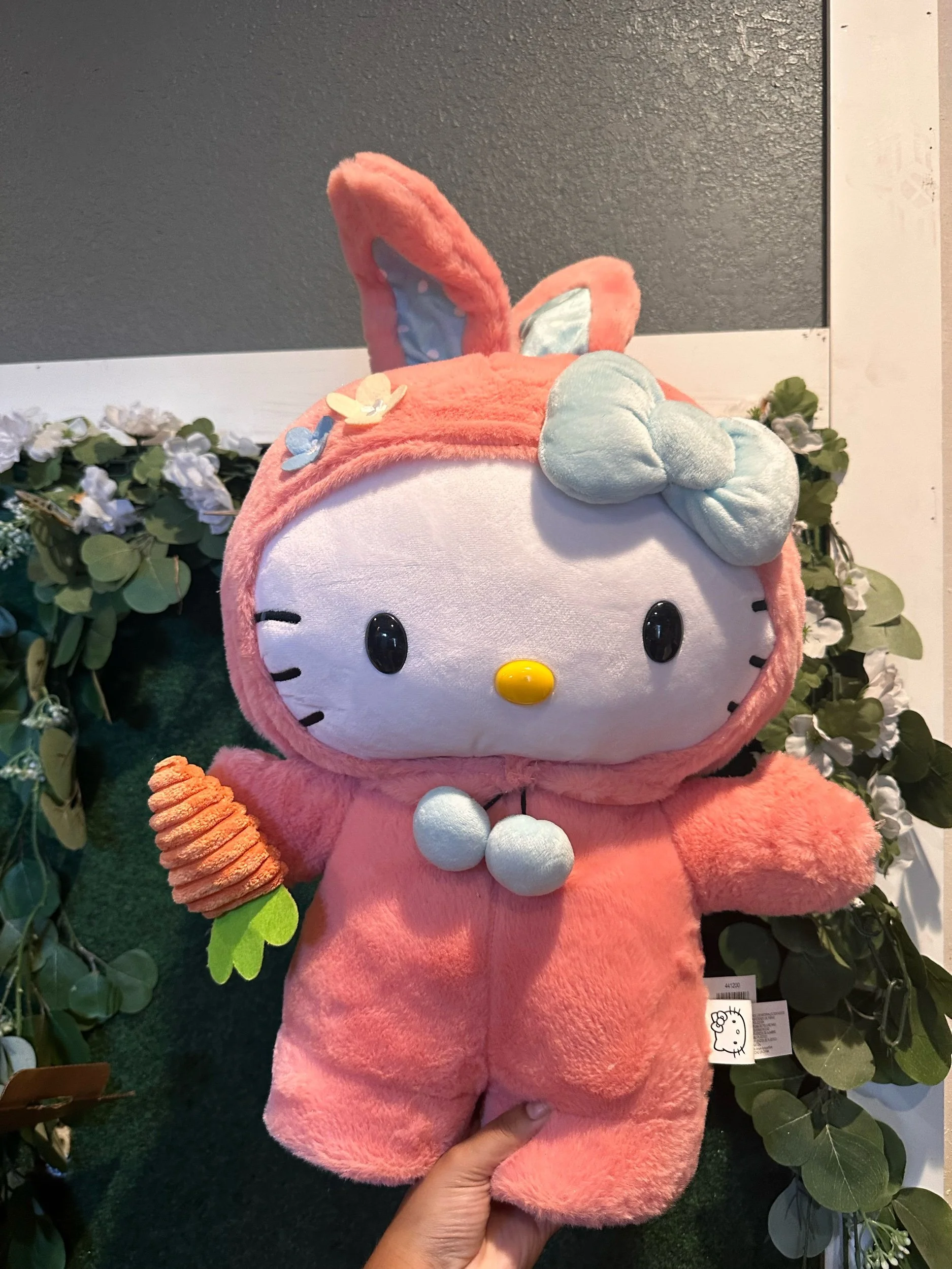 Large Easter-themed Hello Kitty Bunny plush toy holding a carrot.
