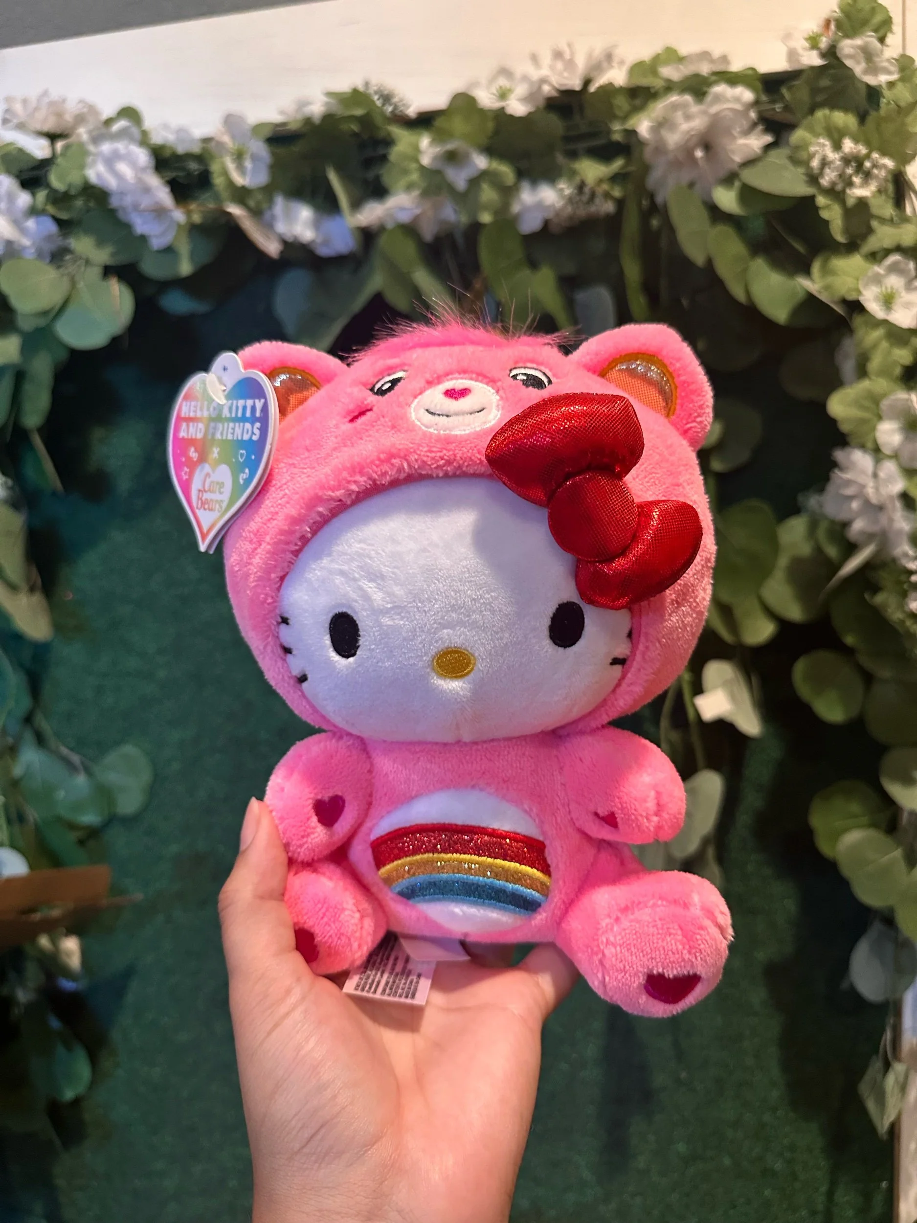 Hello Kitty and Care Bear themed plush toy.