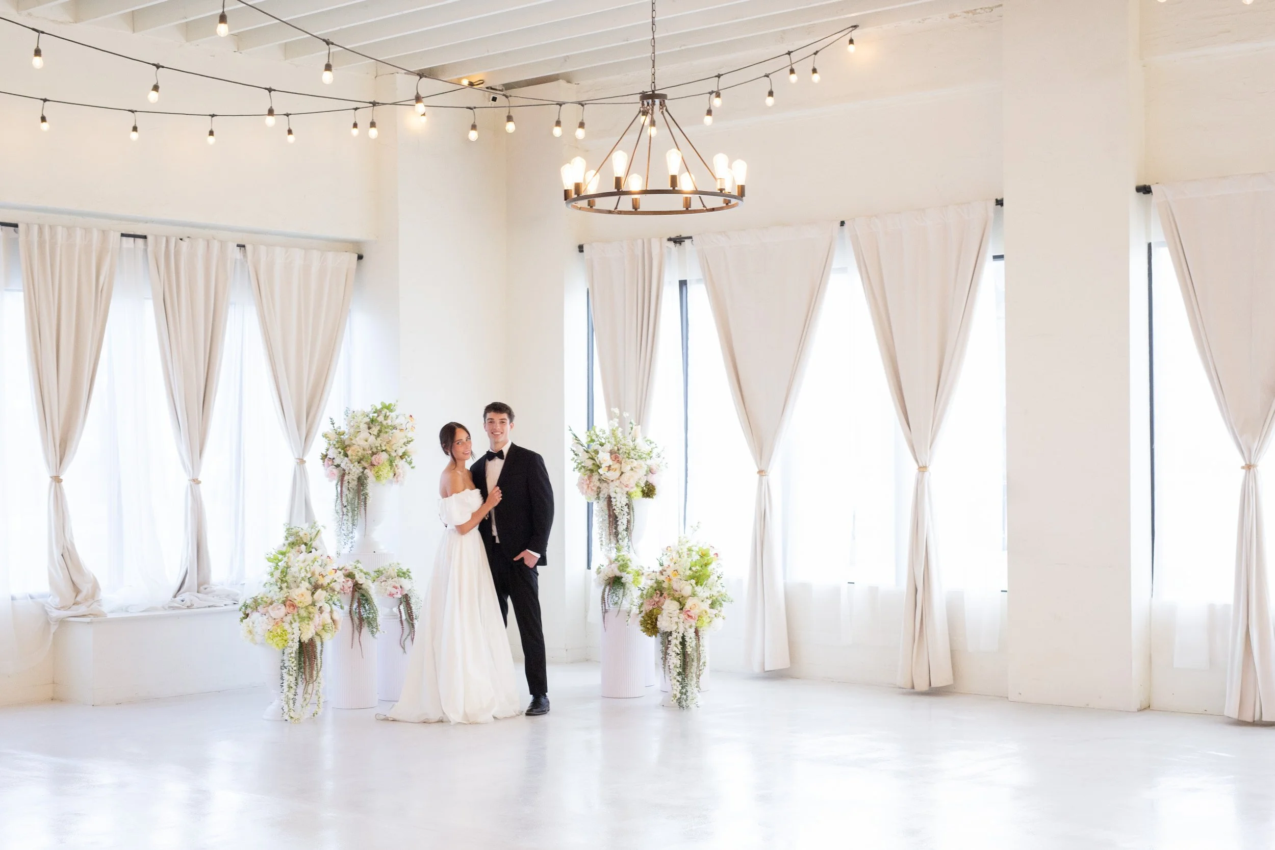 modern-wedding-venue-great-hall-string-lights-the-ivory-hall-provo-utah.jpg