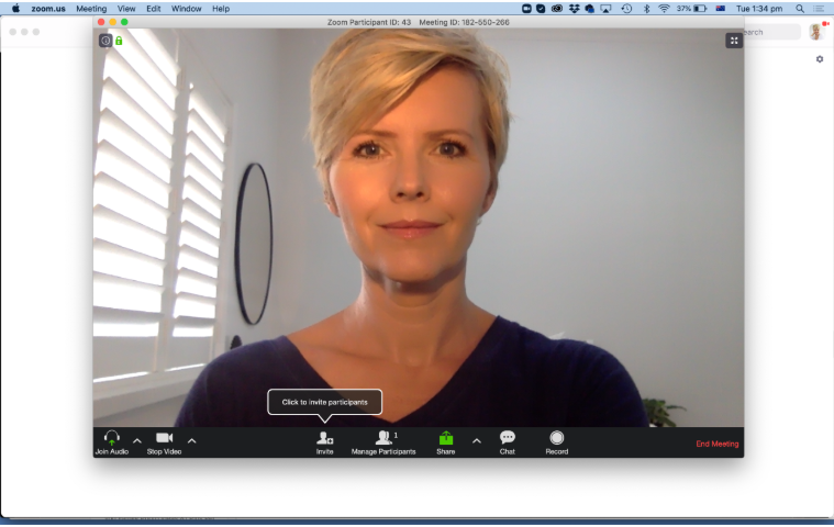 Video call example showing bright direct lighting creating harsh highlights on a professional’s face.