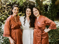 3 woman pose for bridal hair and make up