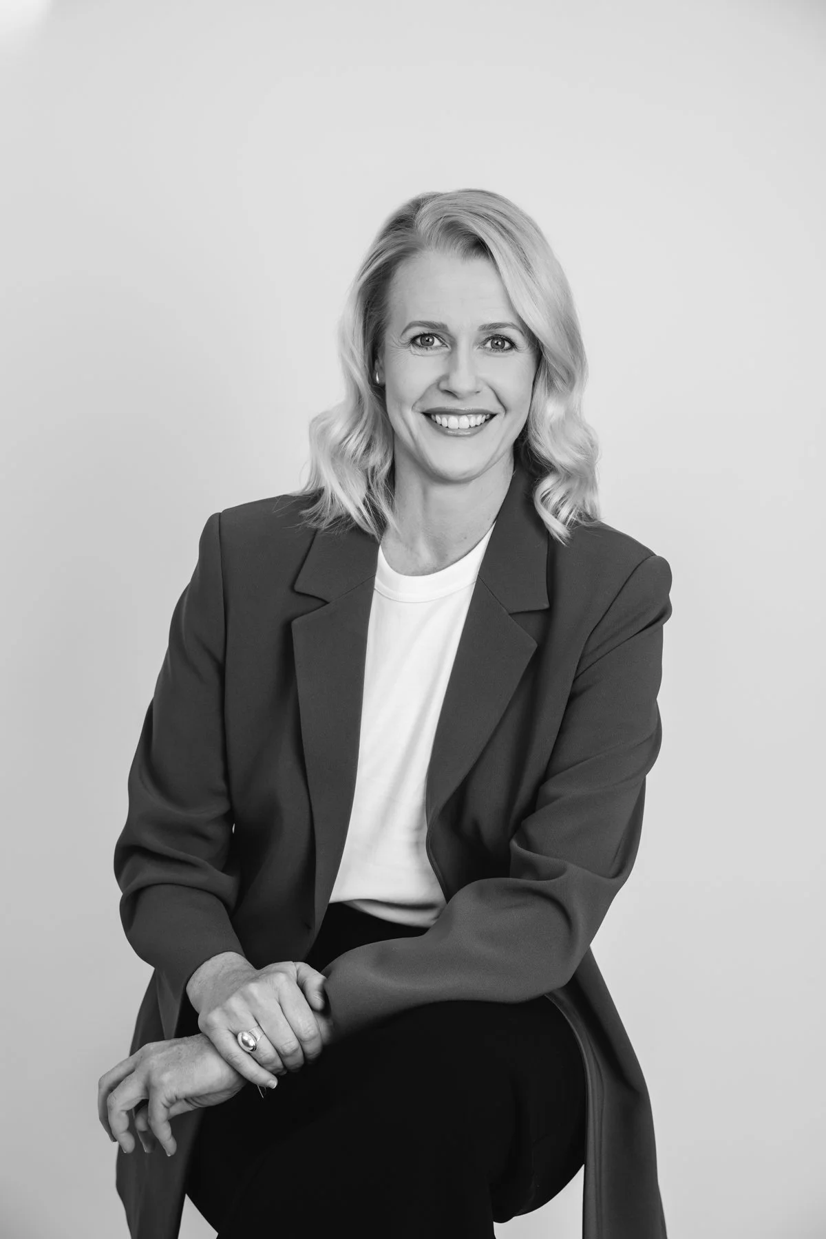 Professional LinkedIn headshot of a business professional, showcasing a polished and approachable profile photo for career and personal branding.