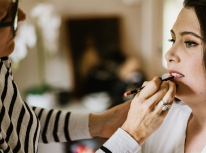 Simona doing makeup for bride