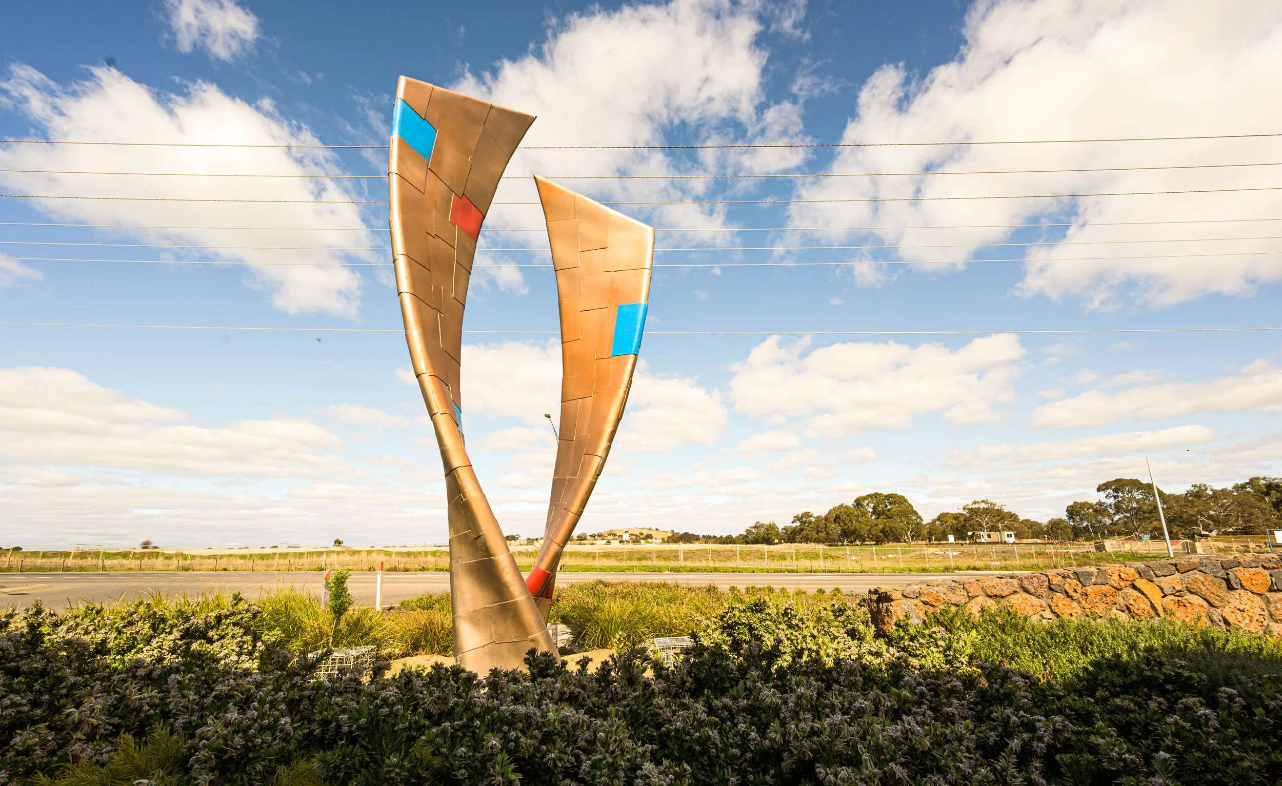 Sculpture honours the historical importance of the 19th century Sydney to Melbourne train line’s influence in Donnybrae by artist and blacksmith David Wood.
