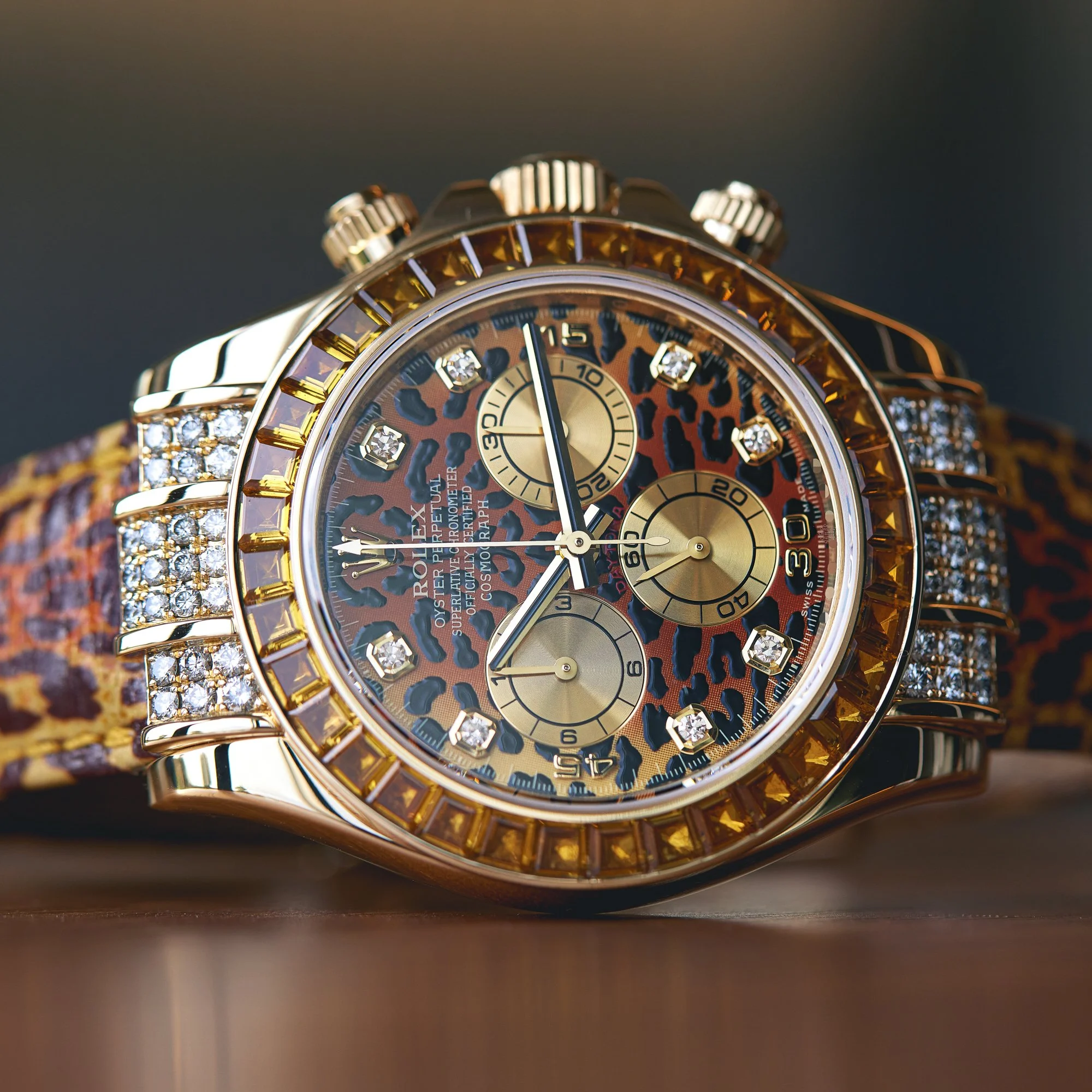Wild design. 🌟 The Rolex Daytona 116598SACO - 40 mm in 18K yellow gold, featuring a lacquered leopard dial, cognac sapphire bezel, and diamond accents. It&rsquo;s loud. It&rsquo;s bold. Are you brave enough to pull this off? 

#Rolex #Daytona #Leopa