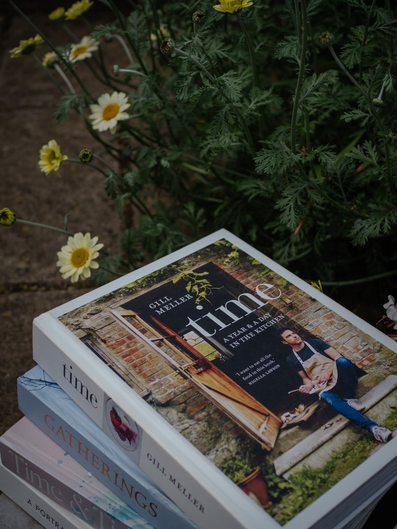 A collection of seasonal cookbooks by Gill Meller, Flora Shedden, Angus Birditt, Emily Scott, and Cherie Denham, with Gill Meller’s Time on top.